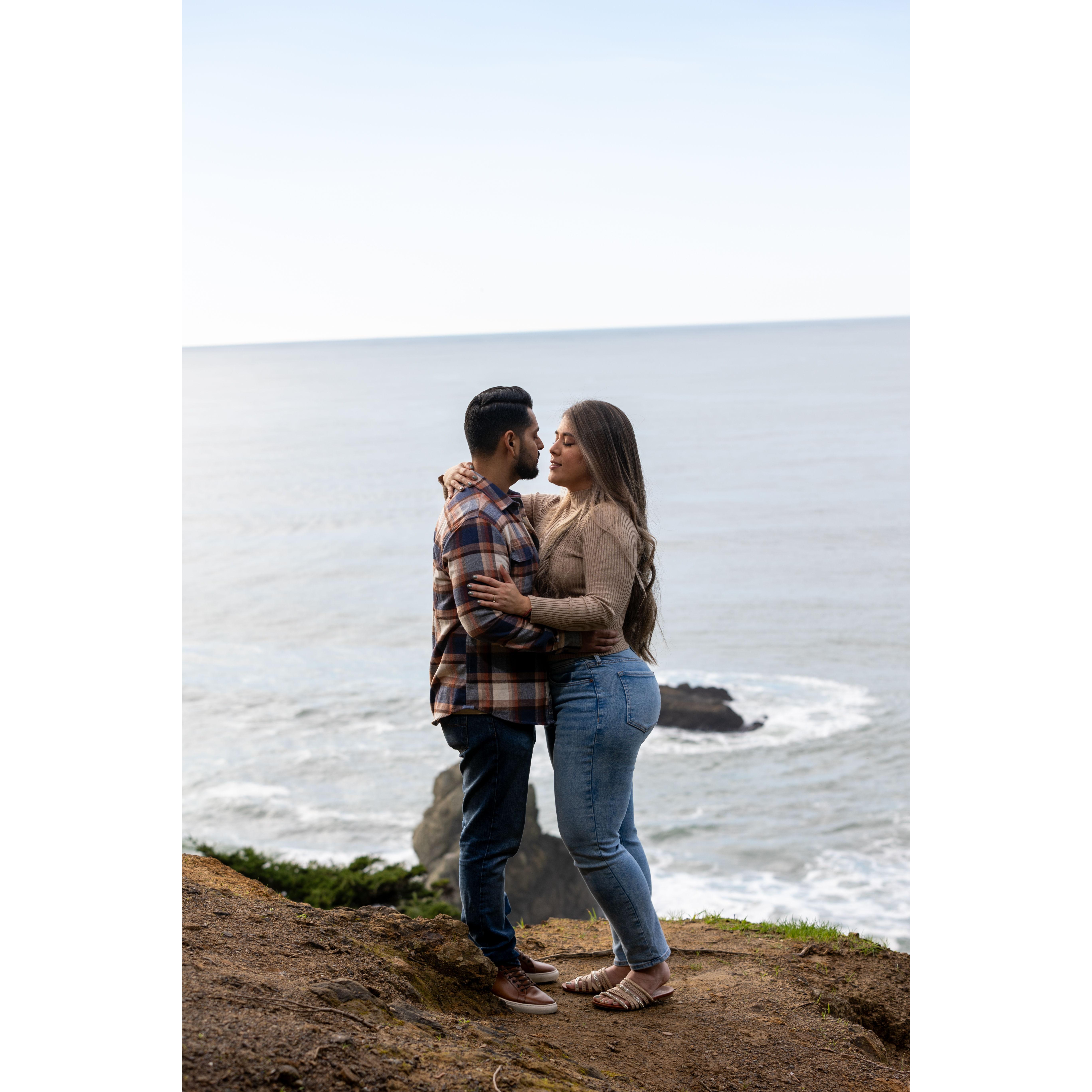 Lost in love on a cliff, where every glance speaks volumes against the backdrop of the endless ocean. 🌊💑 #HikingHearts #OceanRomance