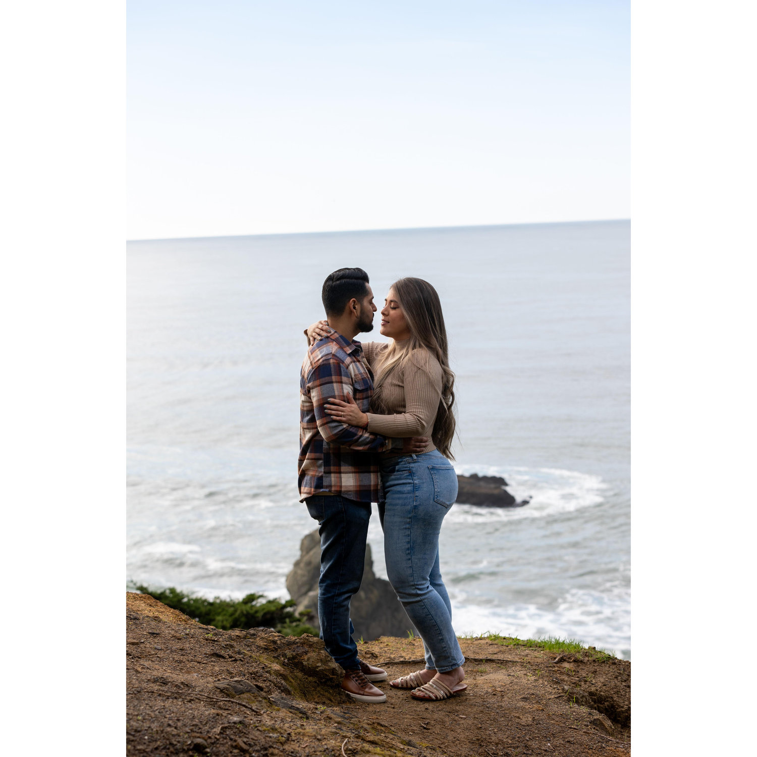 Lost in love on a cliff, where every glance speaks volumes against the backdrop of the endless ocean. 🌊💑 #HikingHearts #OceanRomance