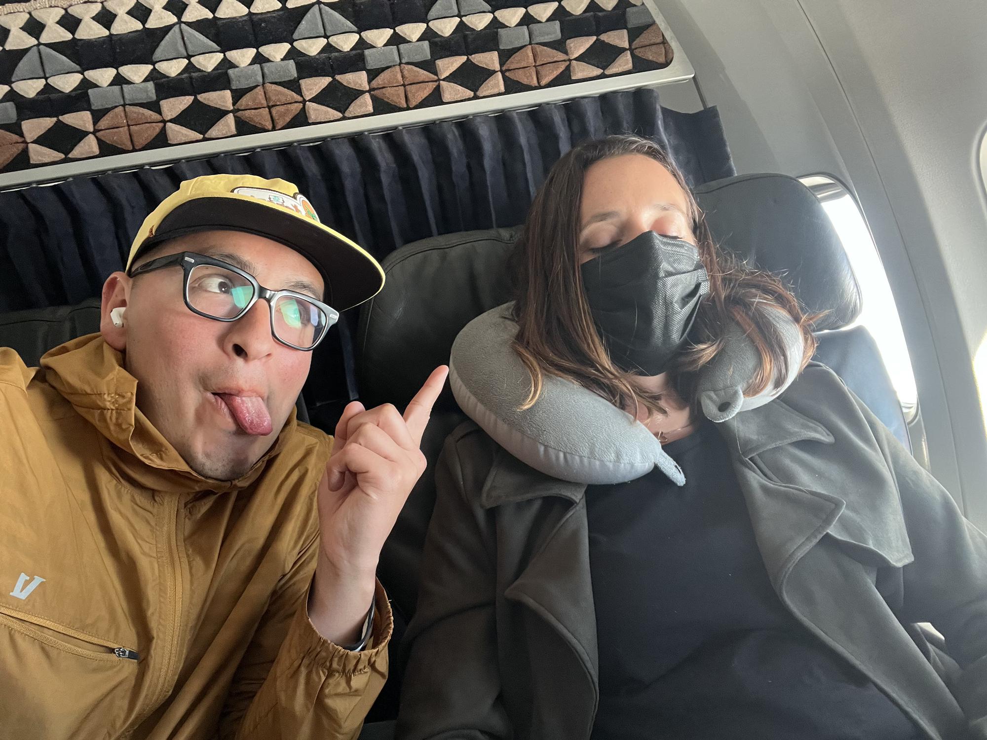 Aaron loves capturing photos of Rosemary while she sleeps on flights.