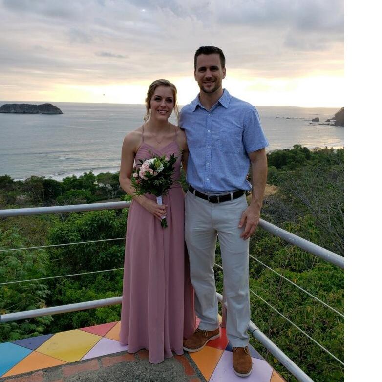 Kyle and Alex's wedding in Costa Rica. This was two days before we got engaged. Where is Ben hiding the ring???