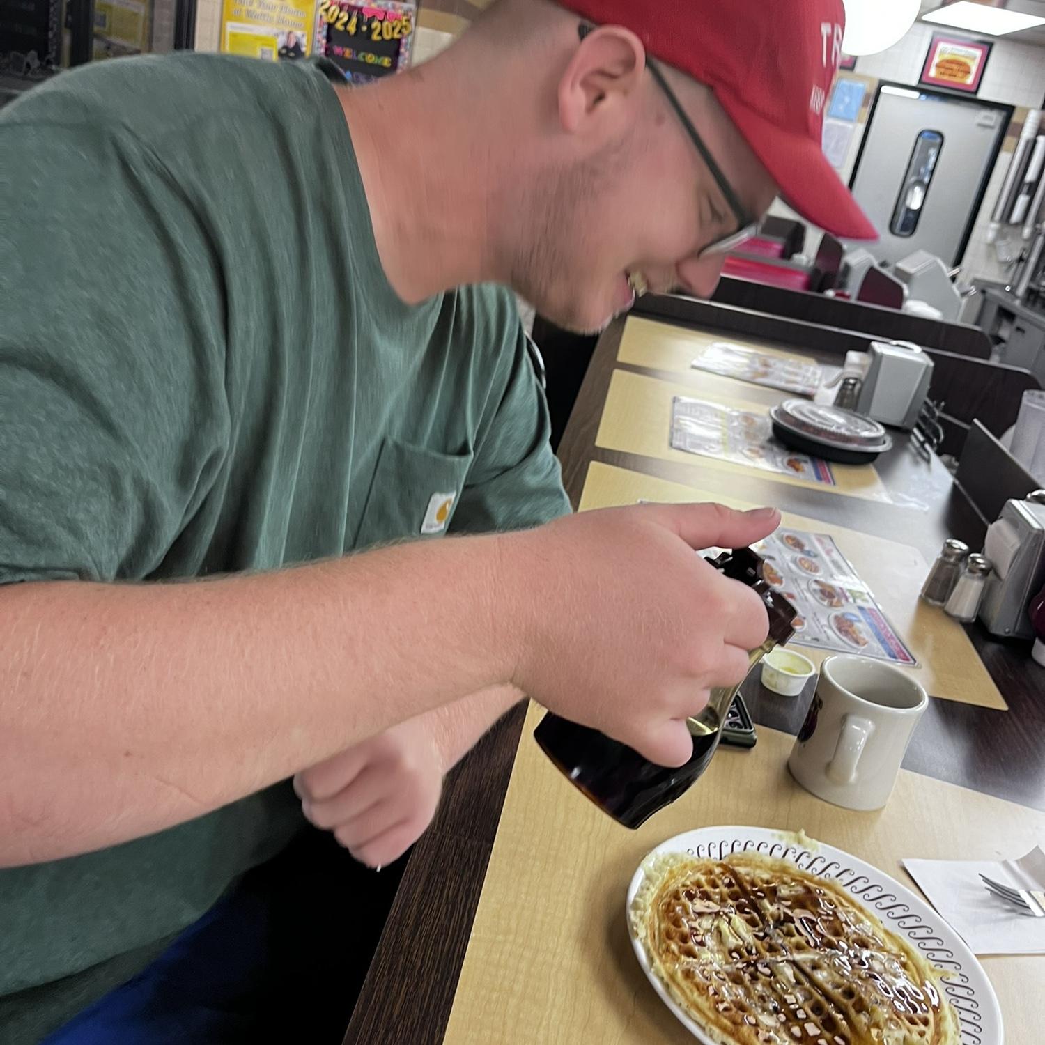 He was so excited to finally try Waffle House!