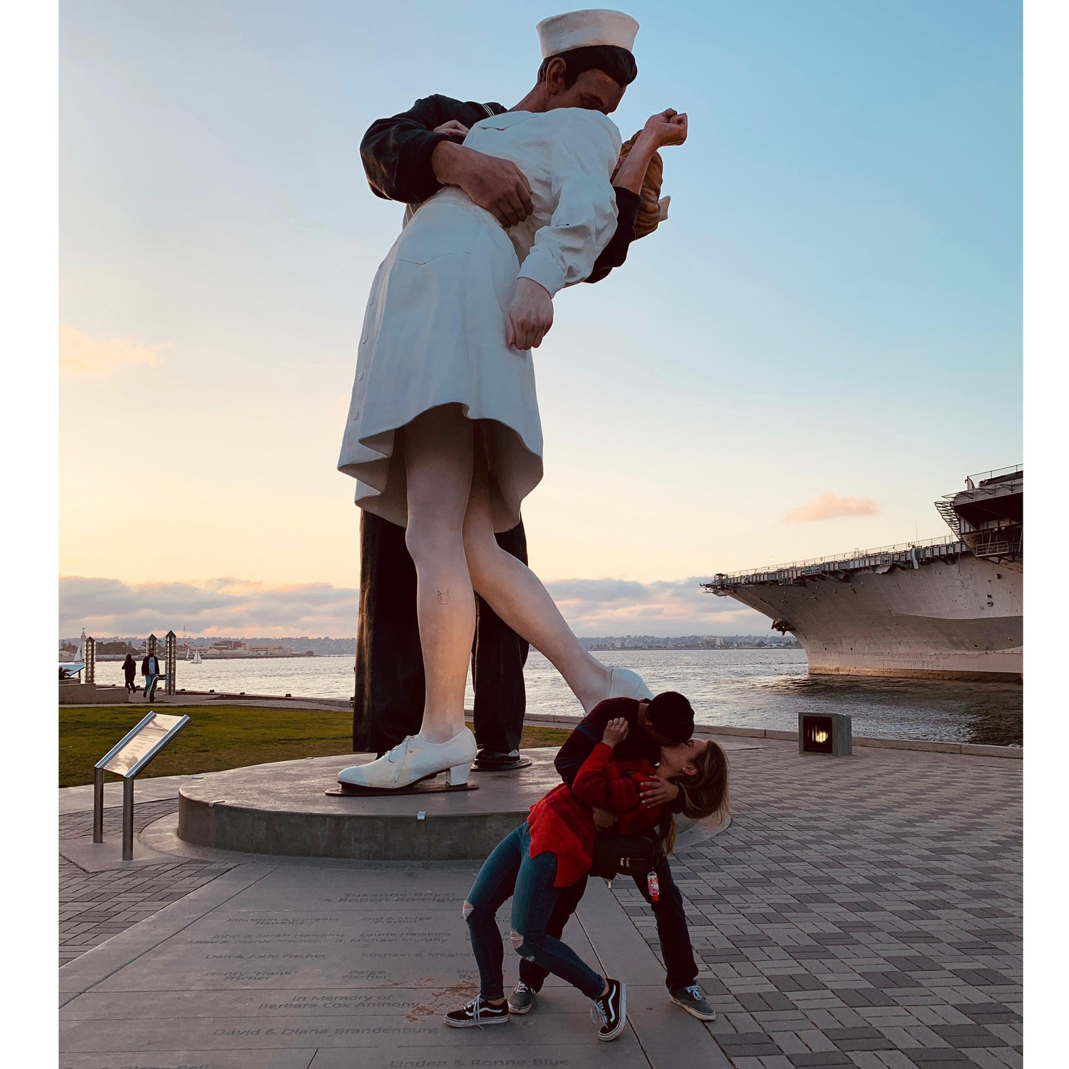 A homage to the famous 25-foot tall kissing sailor statue called "Embracing Peace" in downtown San Diego.