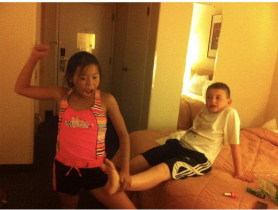 Santa Fe, New Mexico. 5th grade trip. Girls painting the guy's toenails.