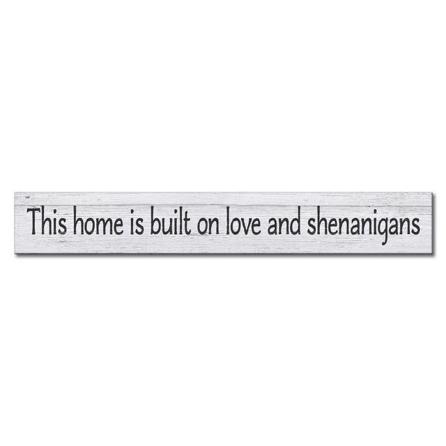 "This Home Is Built On Love And Shenanigans" 24-Inch x 3.5-Inch Wood Wall Plaque