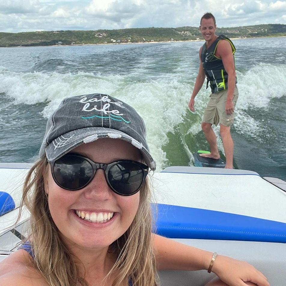Enjoying one of our favorite activities, surfing on Lake Buchanan