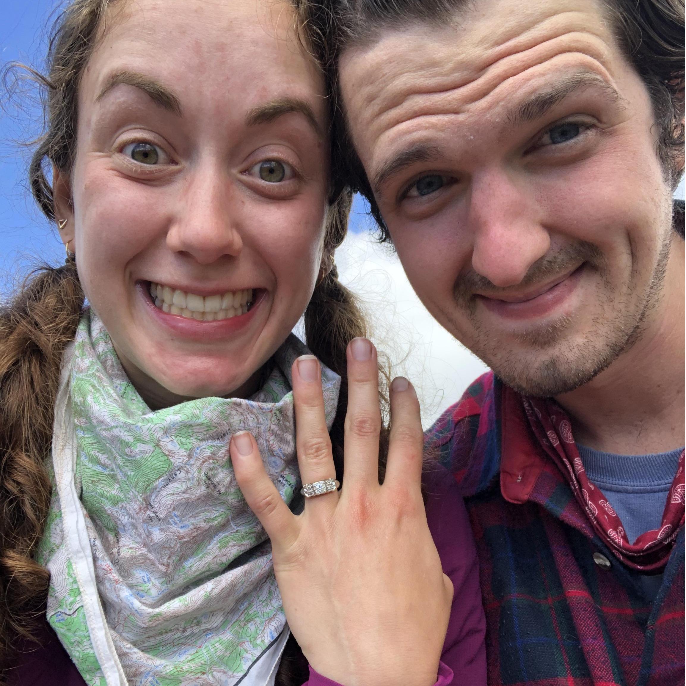 Logan proposes to Amelia on top of a mountain in Glacier National Park on July 9th, 2020 ❤️