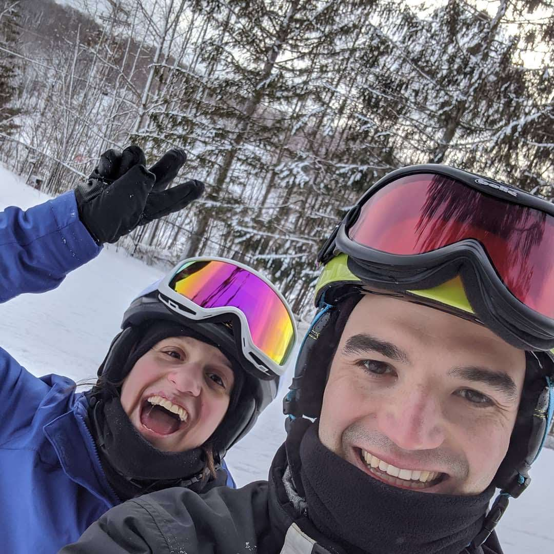 We love skiing! Adam taught Gina how to ski :) 

(he's a great instructor!)