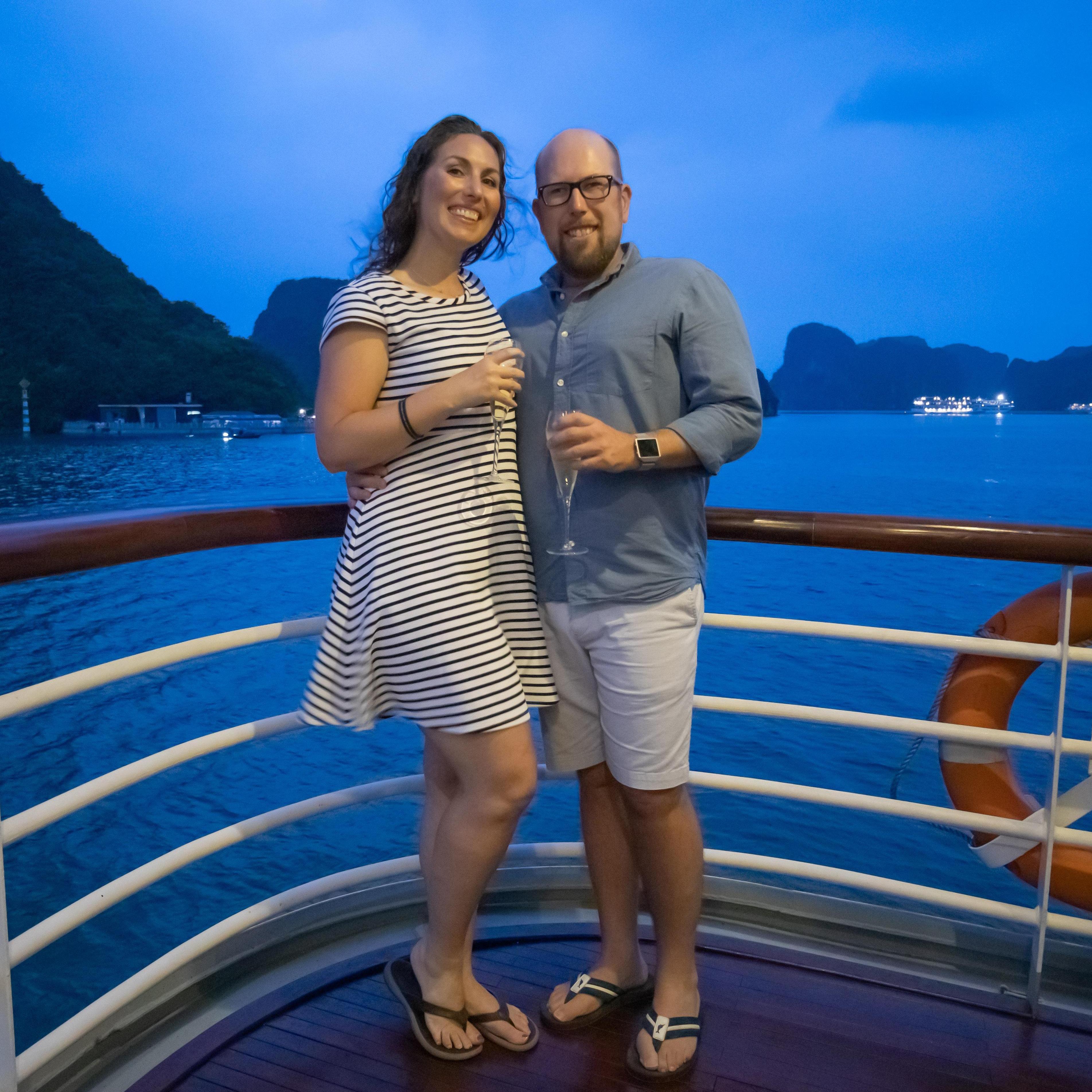 Ned proposed to Dena on the balcony of their stateroom on a cruise through Ha Long Bay, Vietnam.