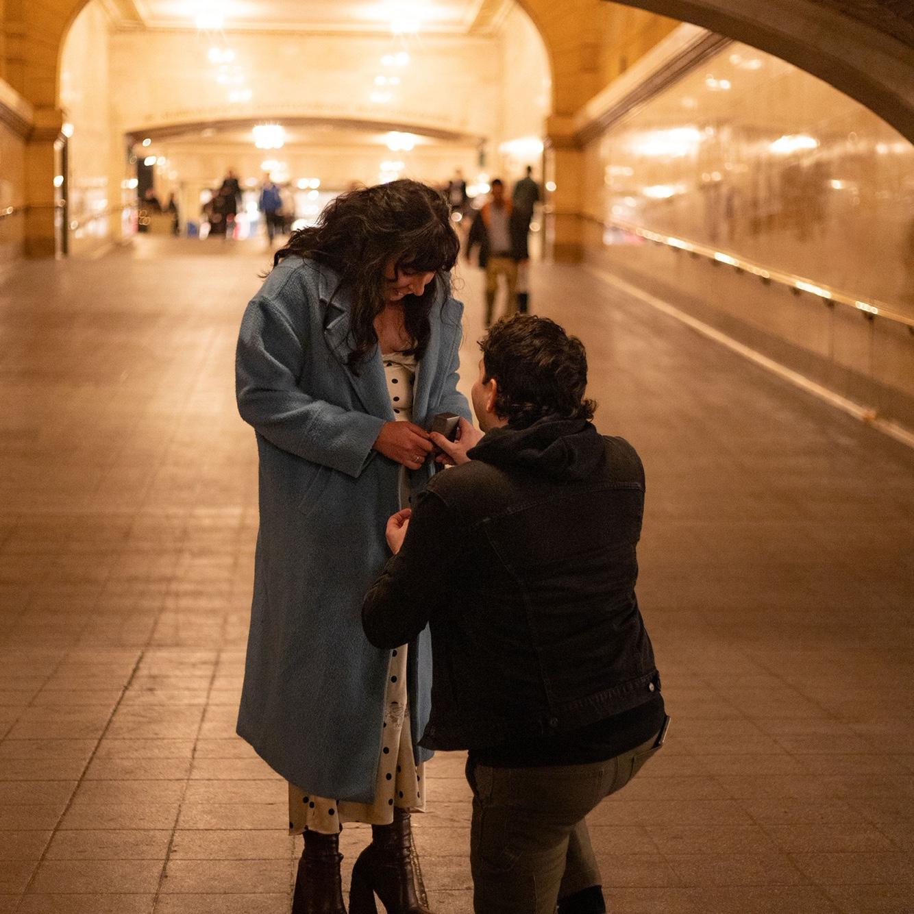 Right after Alec proposed via Grand Central Whispering Arch.