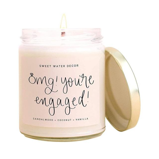 Sweet Water Decor, OMG, You're Engaged! | Coconut, Mahogany, Vanilla, Sandalwood, Musk Scented Soy Wax Candle for Home | Engagement Gift | 9oz Clear Glass Jar, 40 Hour Burn Time, Made in the USA