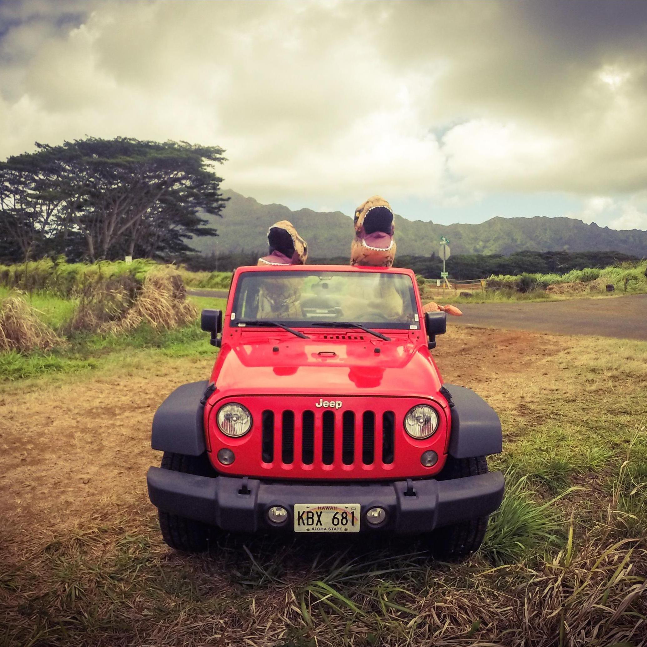 Because why would you NOT want to wear a T-rex costume in a jeep in Kauai?
