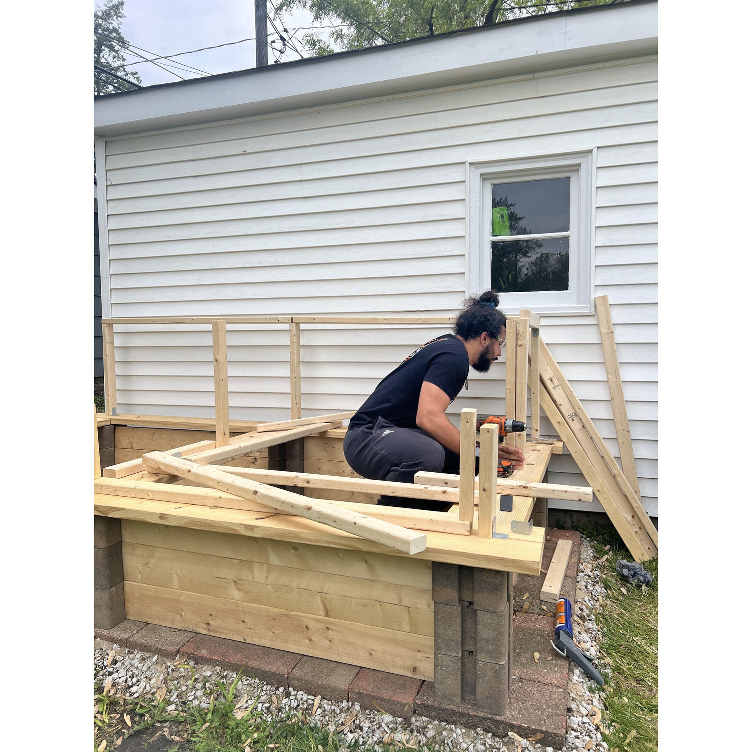 Clayton hard at work (as usual) building the raised garden bed at our new house.