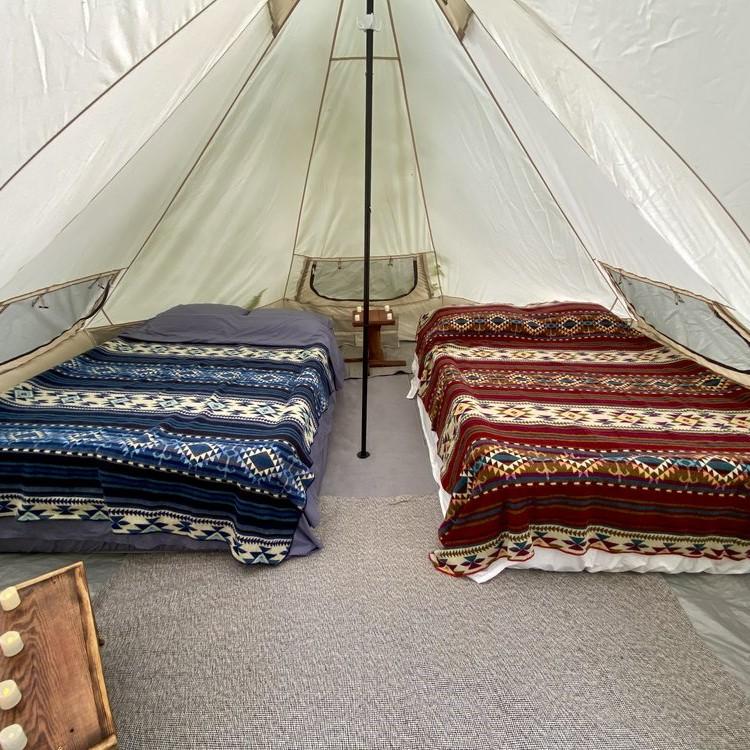 Each tent comes equipped with a queen size bed. A second bed can be added upon request for an additional $50.