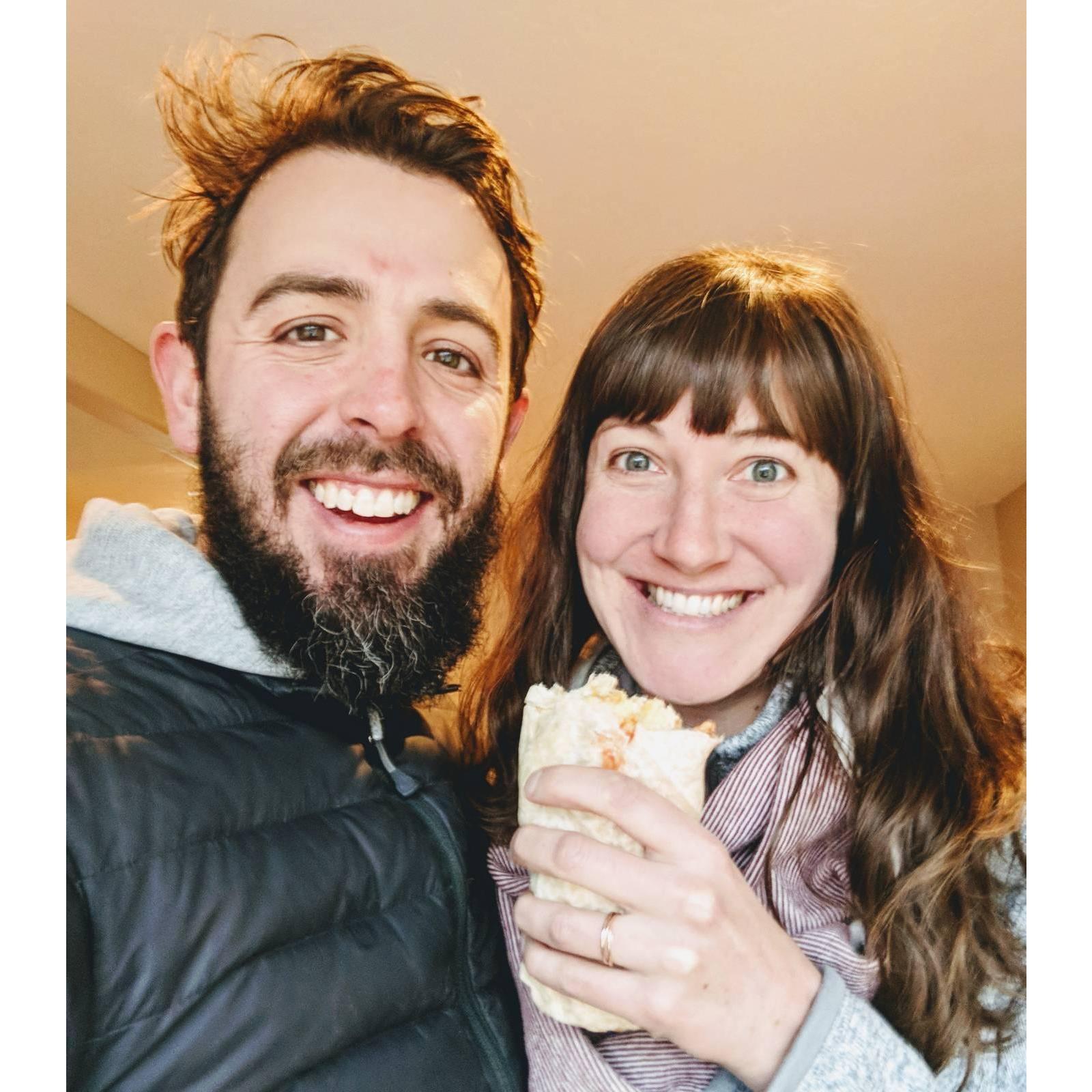 Engaged with breakfast burrito in hand!