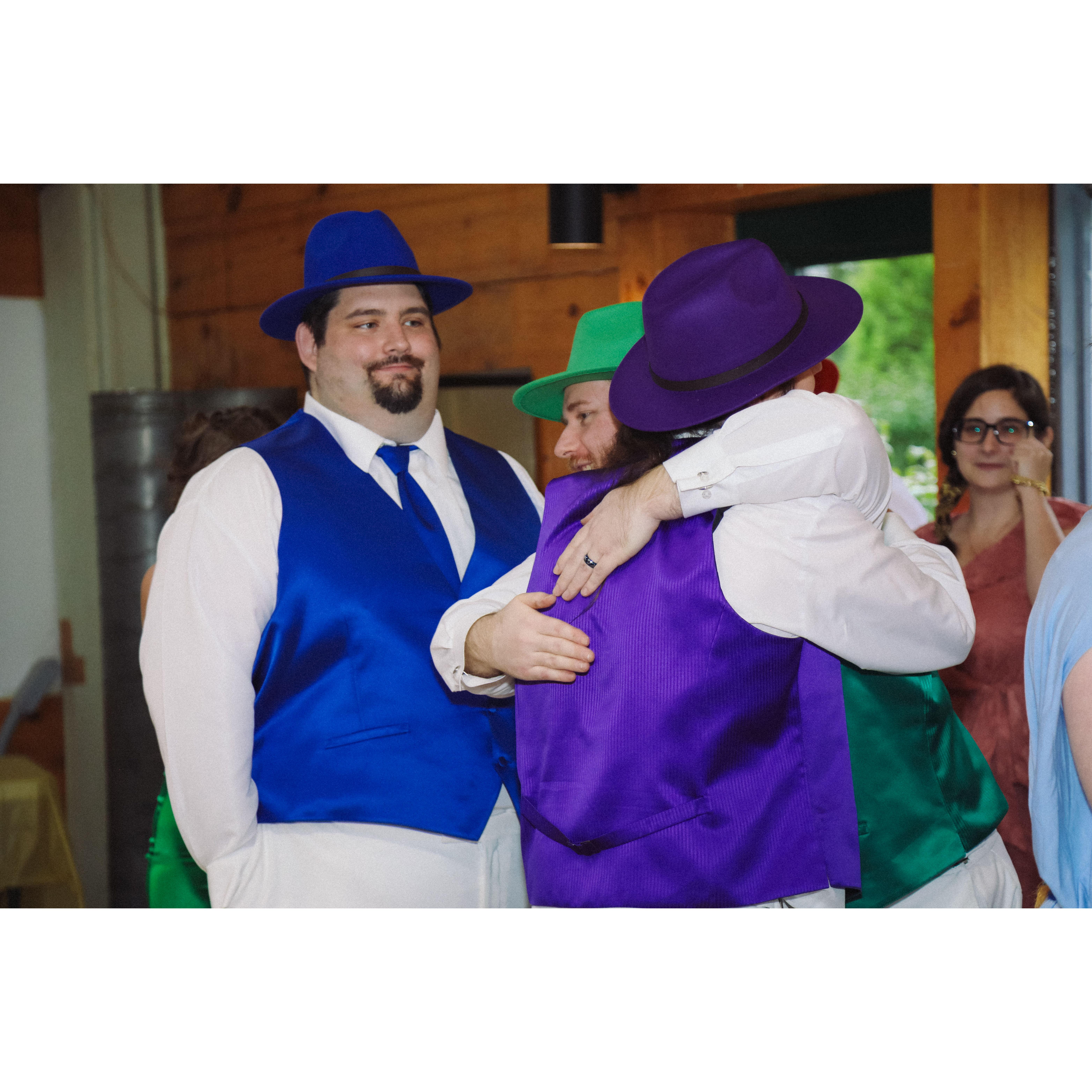 after the ceremony, Herb and Chris sharing a hug with Sean in the background