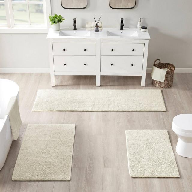 21"x34" Plume Feather Touch Reversible Bath Rug Ivory - Beautyrest