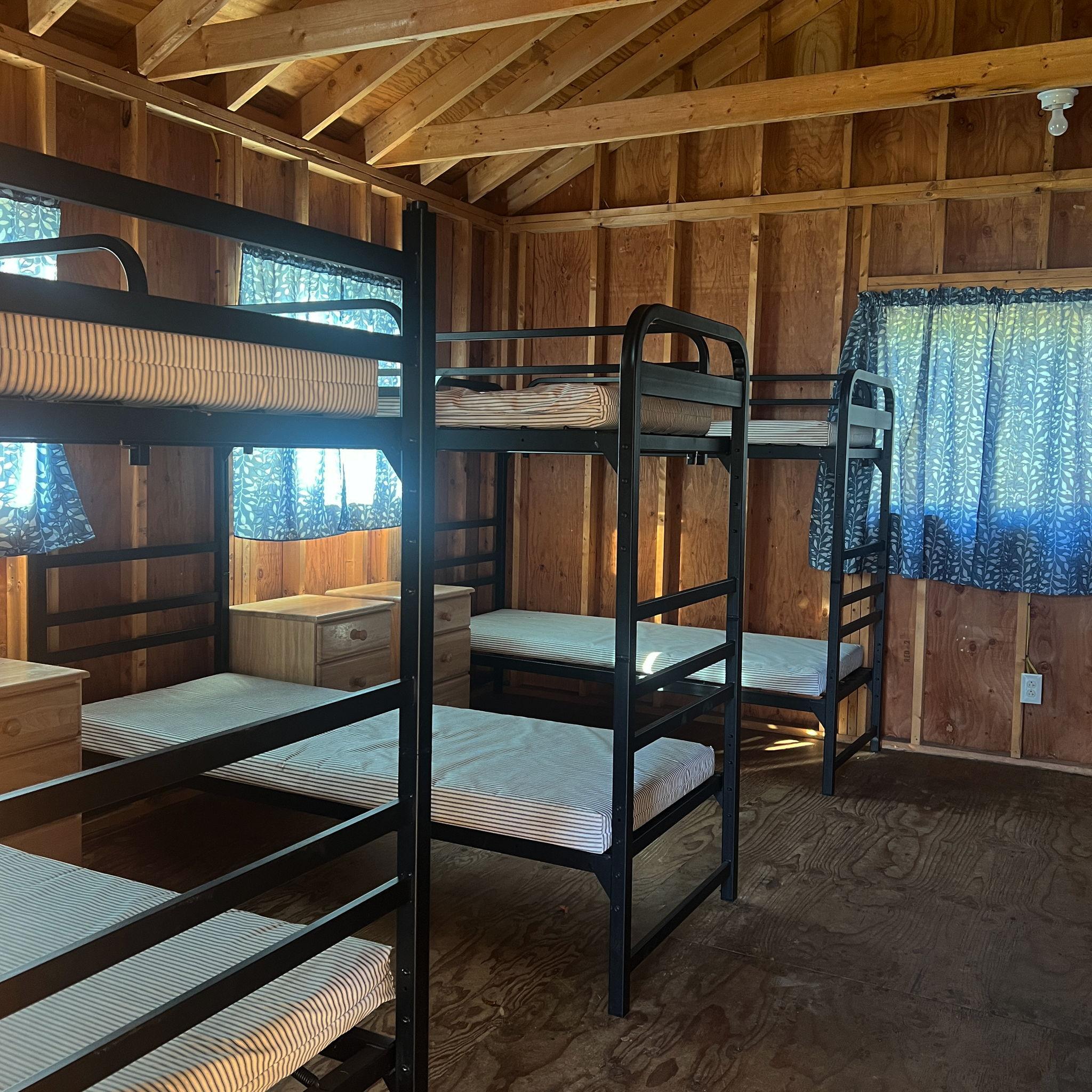 Camp Neringa cabin interior. Cabins can sleep 12 in bunk beds – XL twin size.
