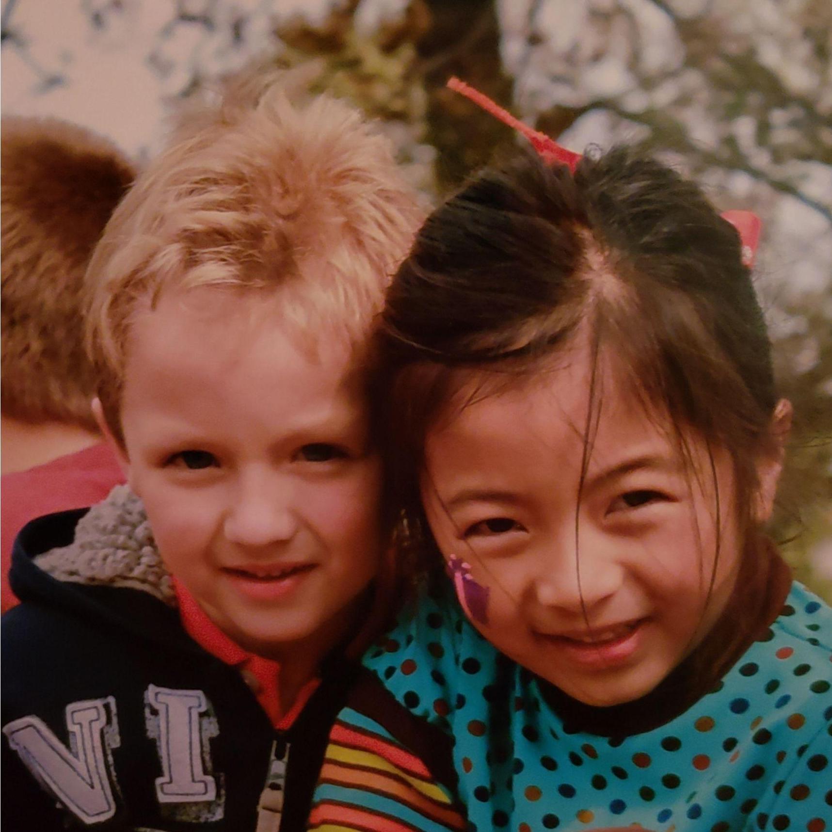 Our first picture of us together in kindergarten at a pumpkin patch.