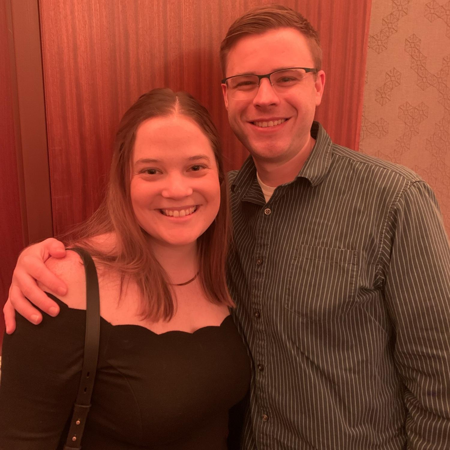 Our first photo together! We are at Chris’s company holiday party!