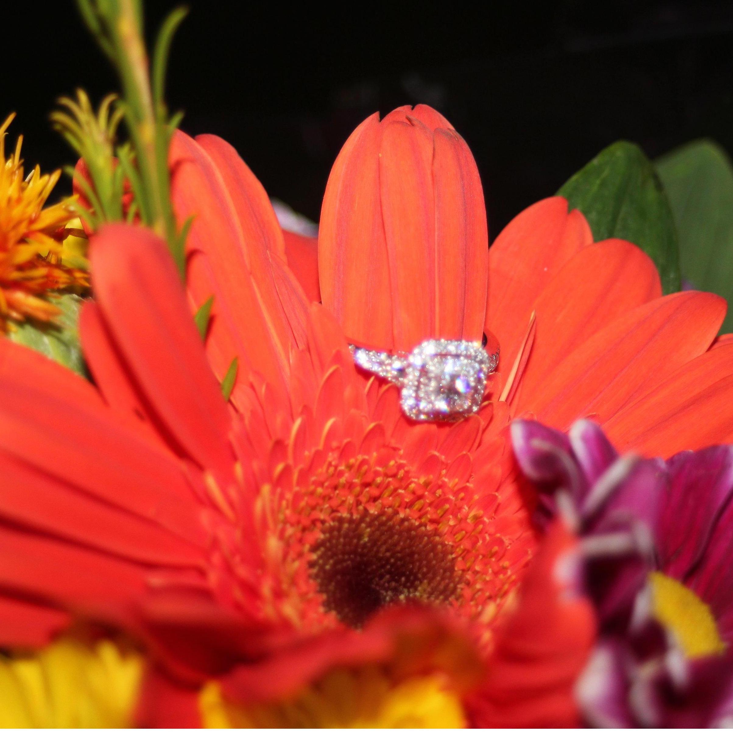 Engagement ring and bouquet.  Flowers did not stop here.  He spoils me so with flowers often.