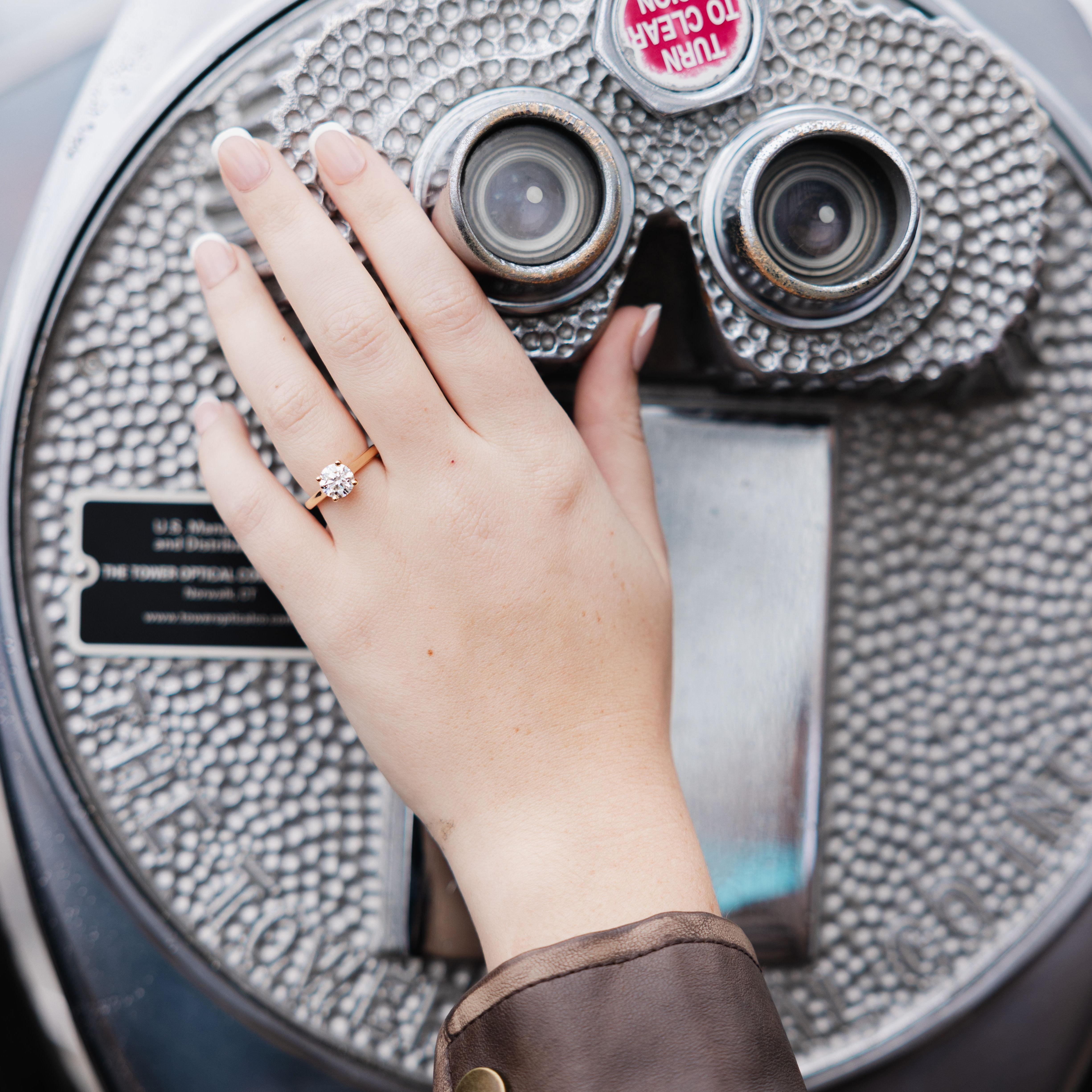 The ring visits the top of the Empire State Building.
