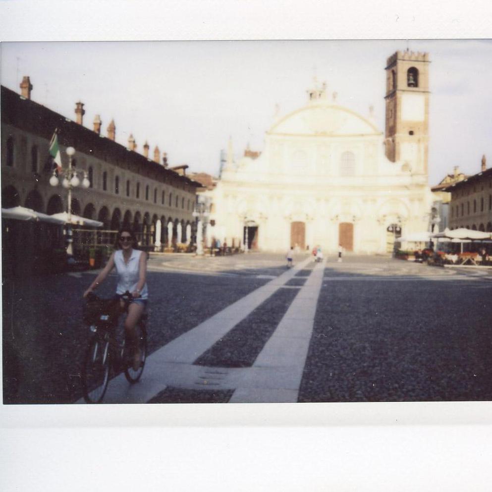 Sarah riding through the Piazza in Vigevano, Alessandro's hometown, in 2015