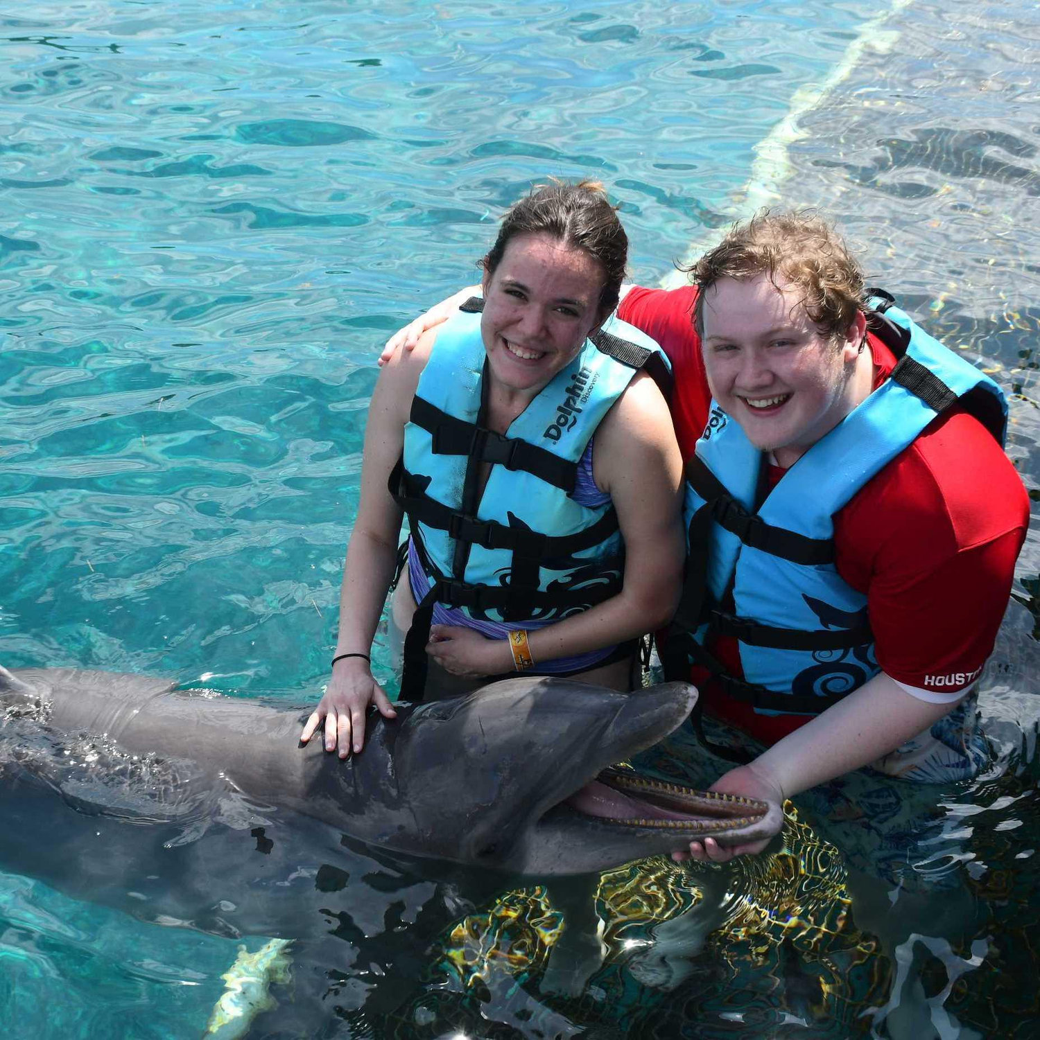 When we went to Cozumel, Mexico on a cruise with the Lindsey family and swam with the dolphins! This was my first time ever getting to see dolphins up close, we had the most amazing trip together :)