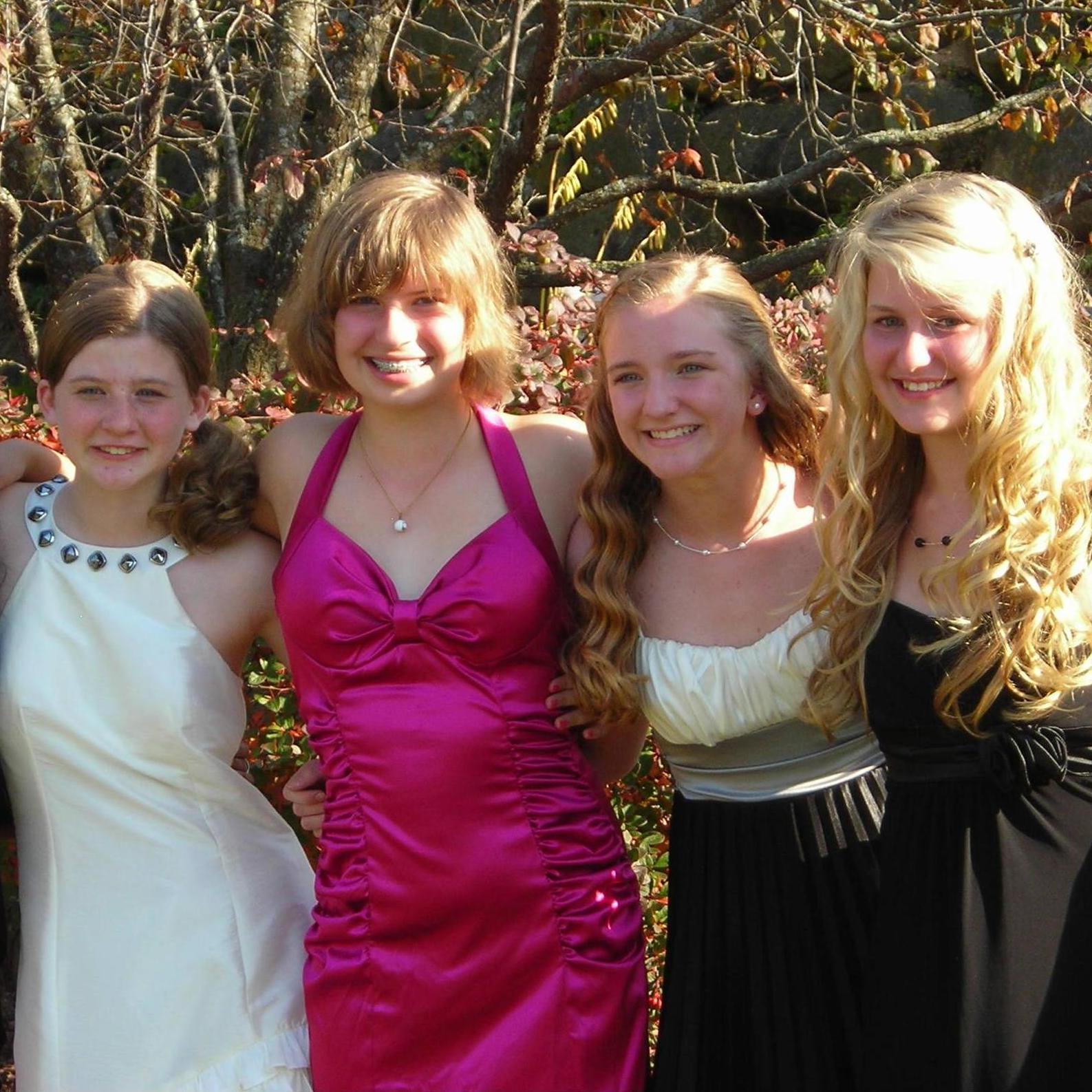 Laura in the pink dress with bridesmaids (left to right) Quinn, Marina, and Mercedes.