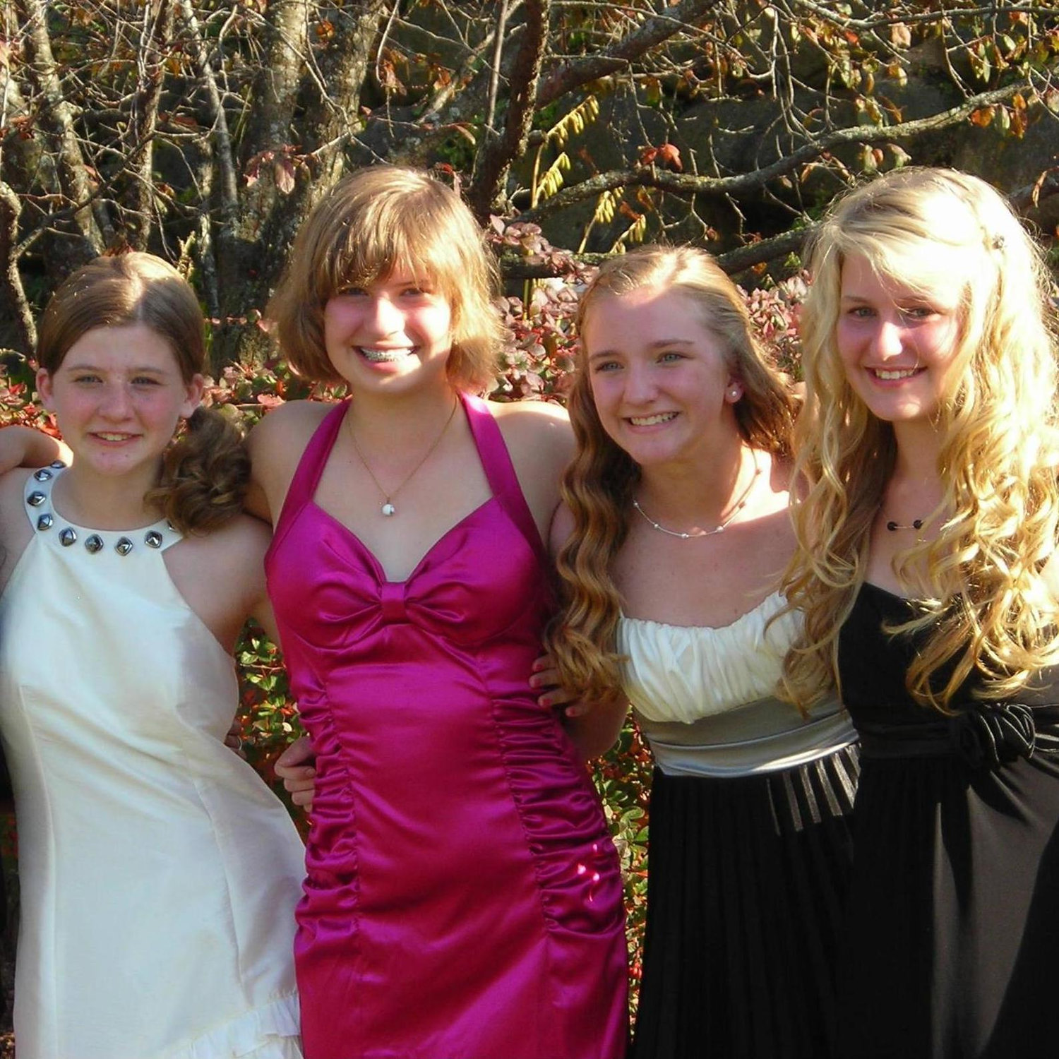 Laura in the pink dress with bridesmaids (left to right) Quinn, Marina, and Mercedes.