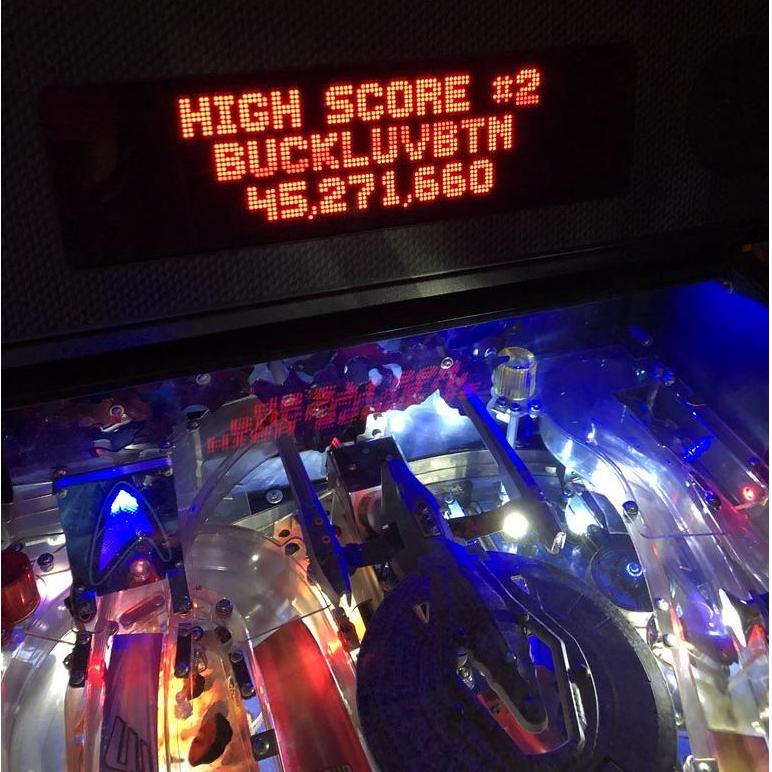 Rob's full pinball name is Buck Squirrel, or BUK. Jen's is Button, or BTN. We've been renting pinball machines from Quarterworld every month since the first pandemic lockdown