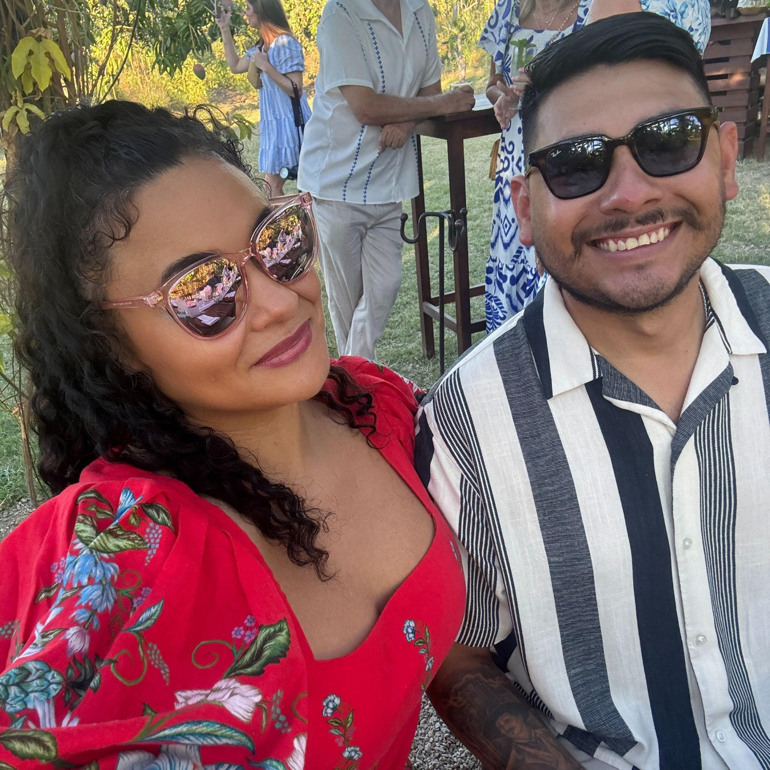 At a friend’s destination wedding—dressed up, celebrating, surrounded by love and feeling pretty lucky ourselves.