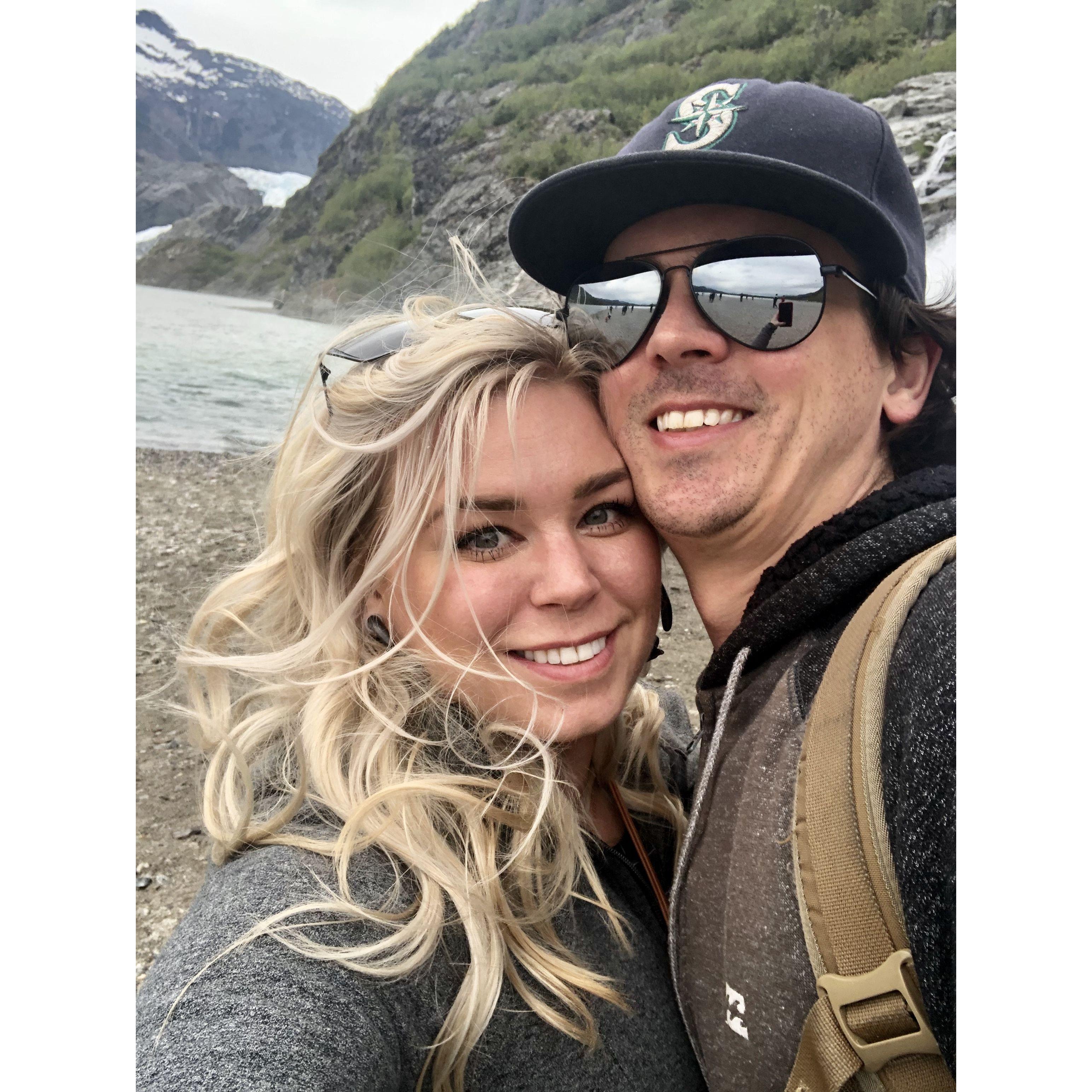 Cruise to Alaska! Happy smiles photographed at Mendenhall Glacier, 2019.