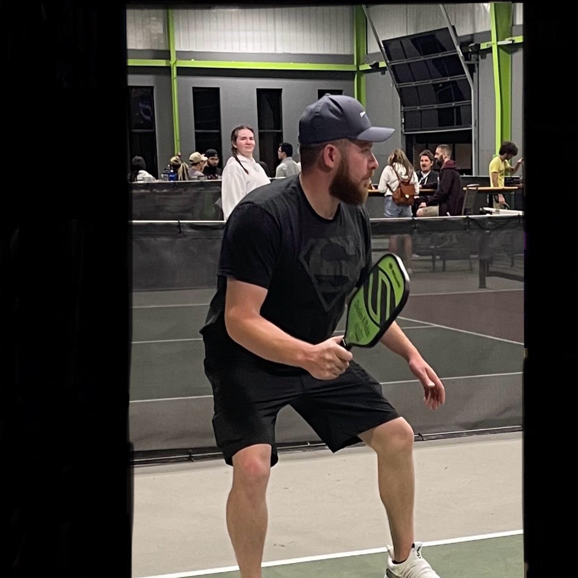 Matt pretending to be a pickleball pro