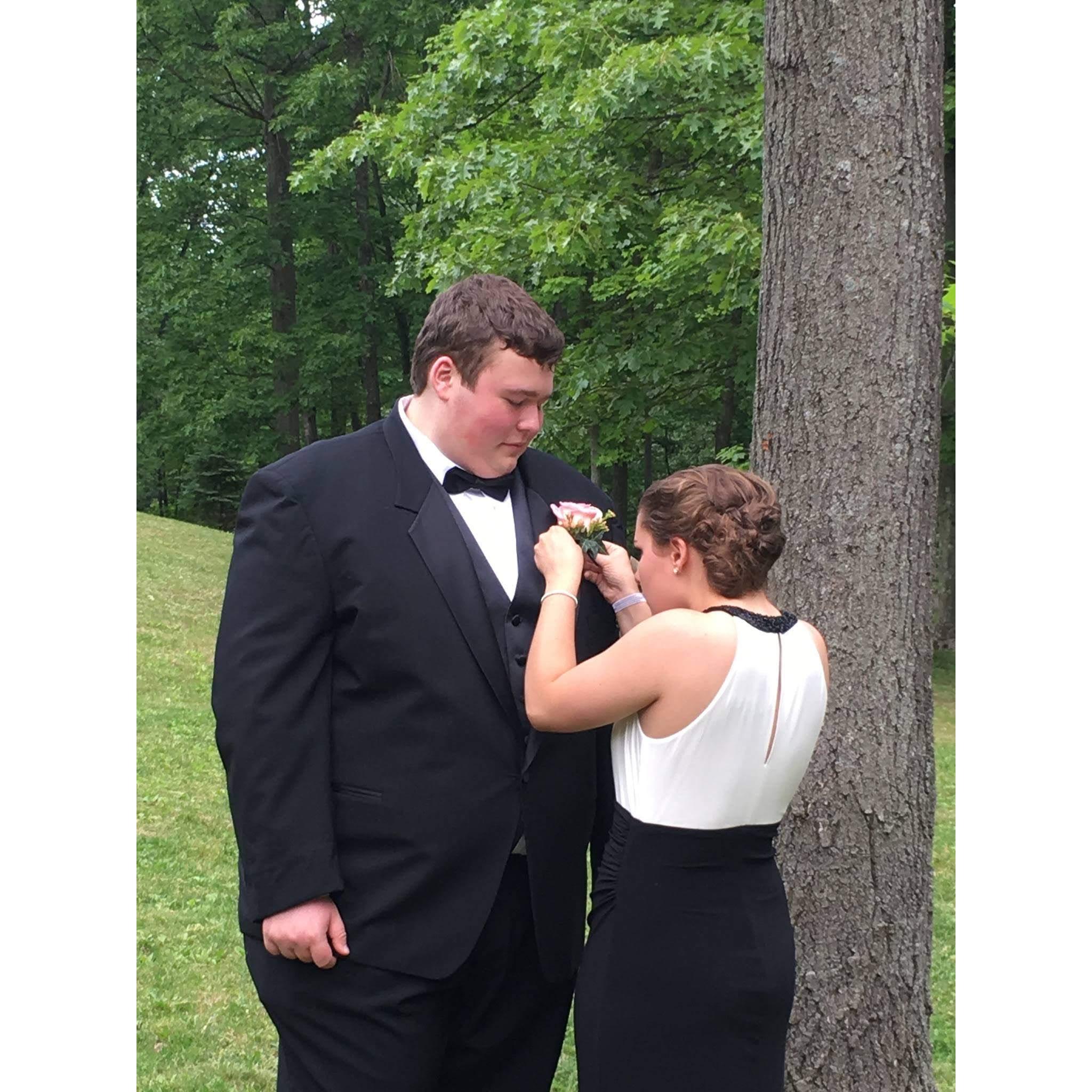 Boutonniere pinning for Juliana's senior prom in 2016.