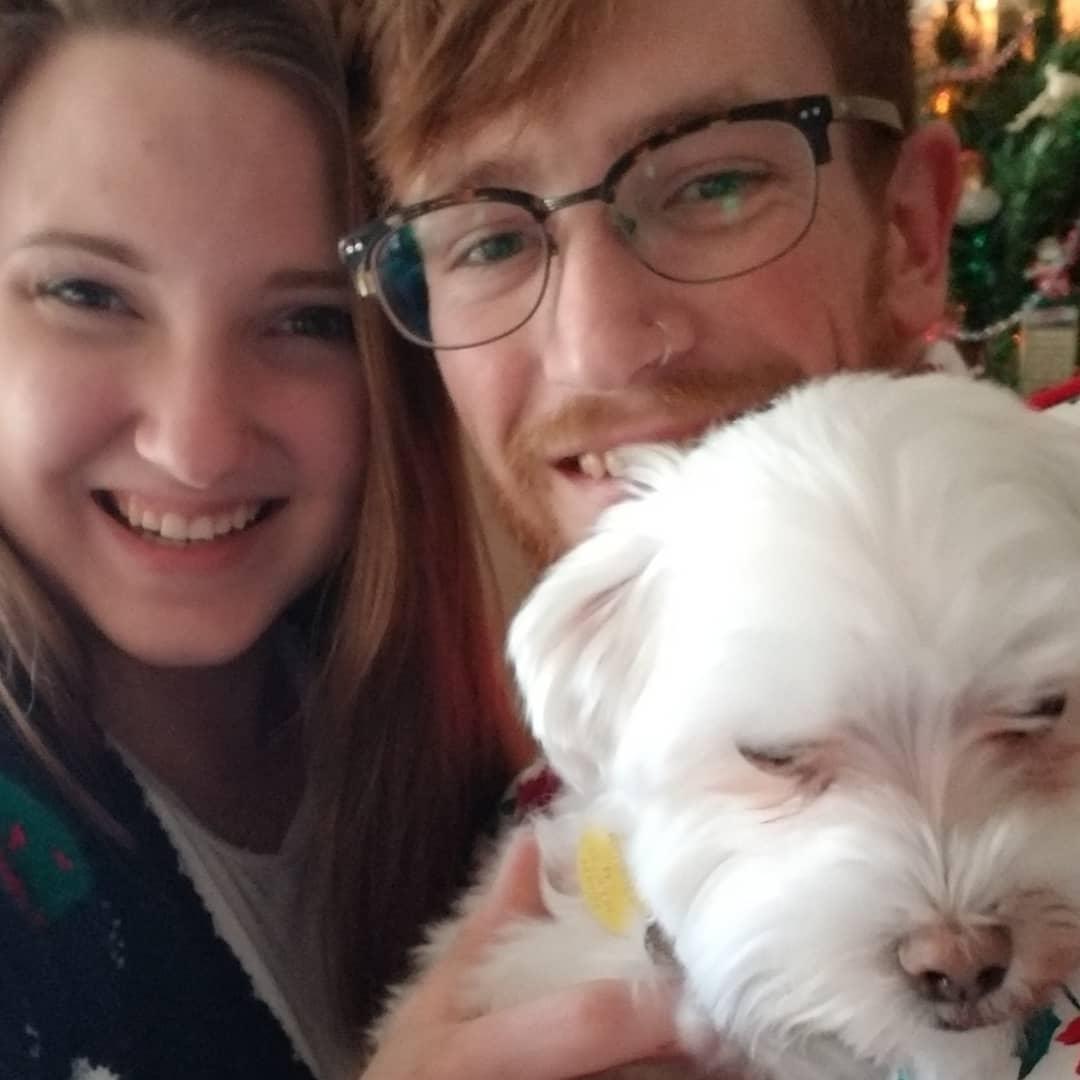 Ugly sweaters and puppy dogs make for a great first Christmas together.