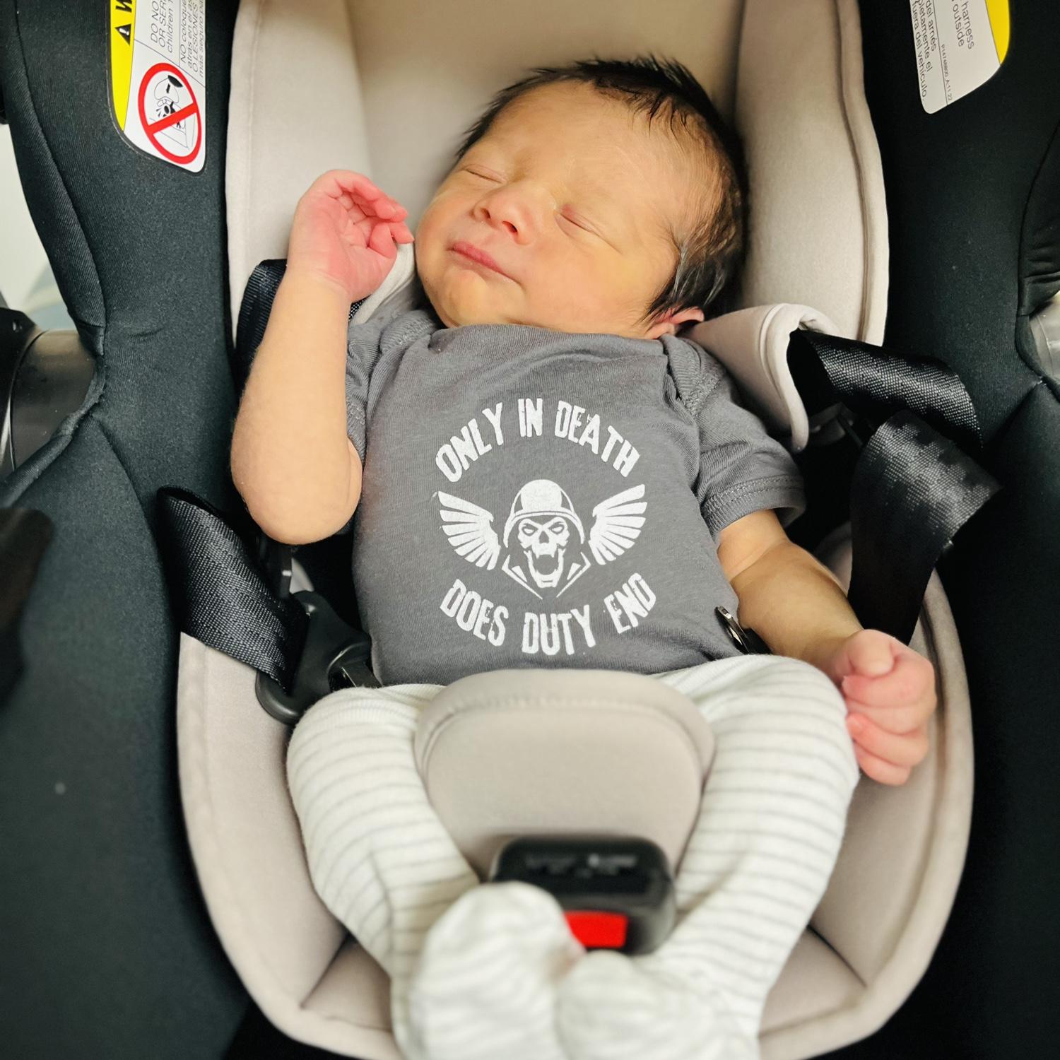 Ian loved this onesie to put baby Jeffrey in after we took him home from the hospital for the first time.