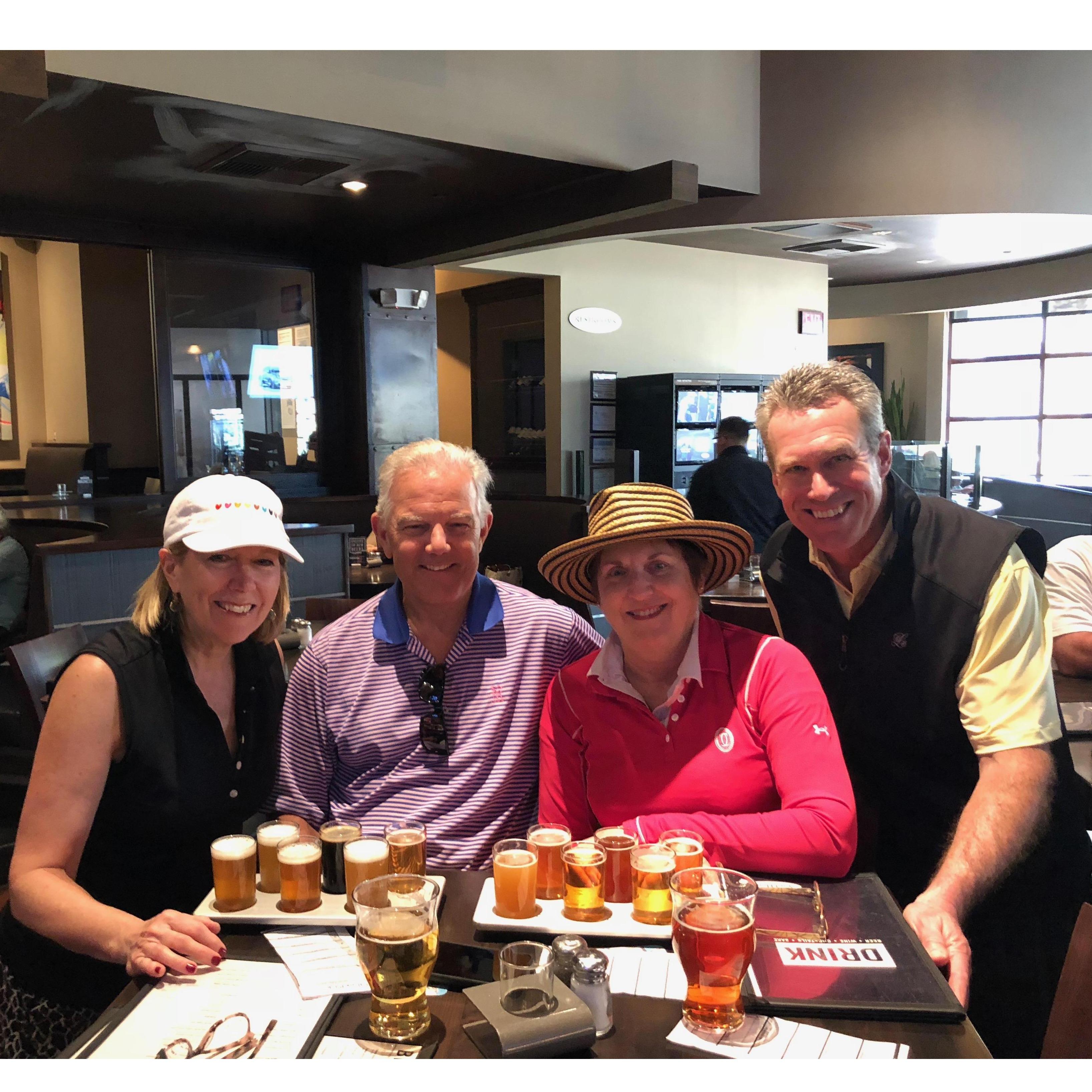 Suzanne, Jim, Michele, and Joe enjoying a flight after a round of golf in Palm Springs! The boys owed the girls a drink after losing a bet!