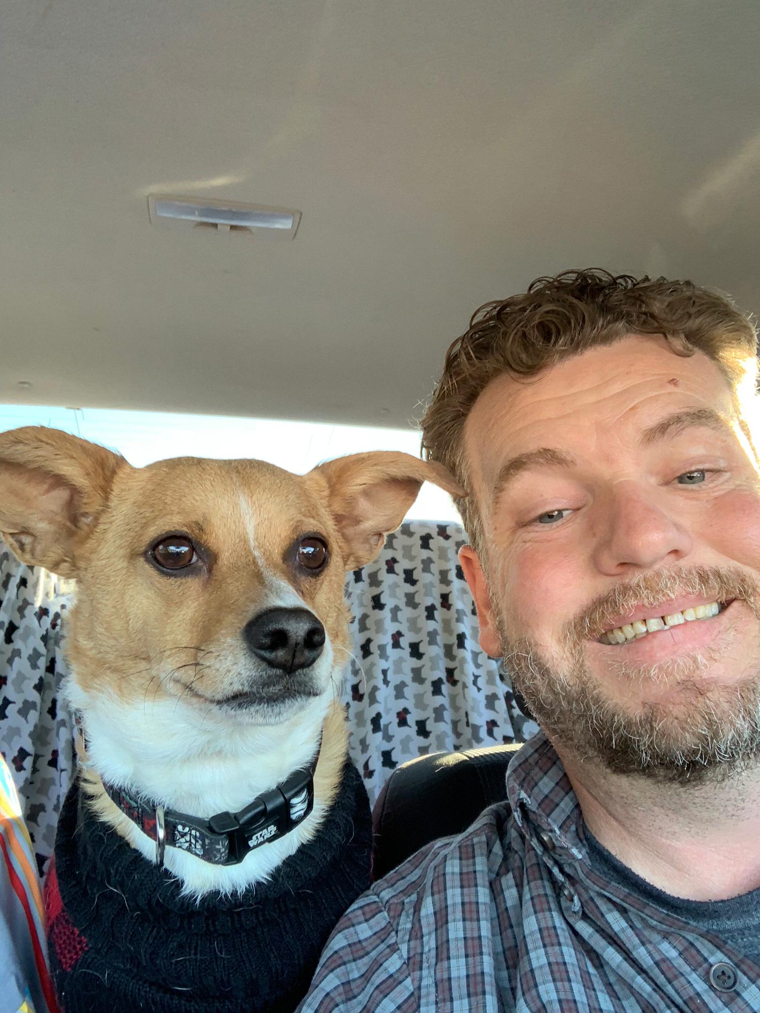2018: While Kimberly was overseas, Duane decided to take a road trip to Canada to get a stamp in his passport. Picture at Canadian border. He says, “you can see the flag in Stafford’s eyes!”