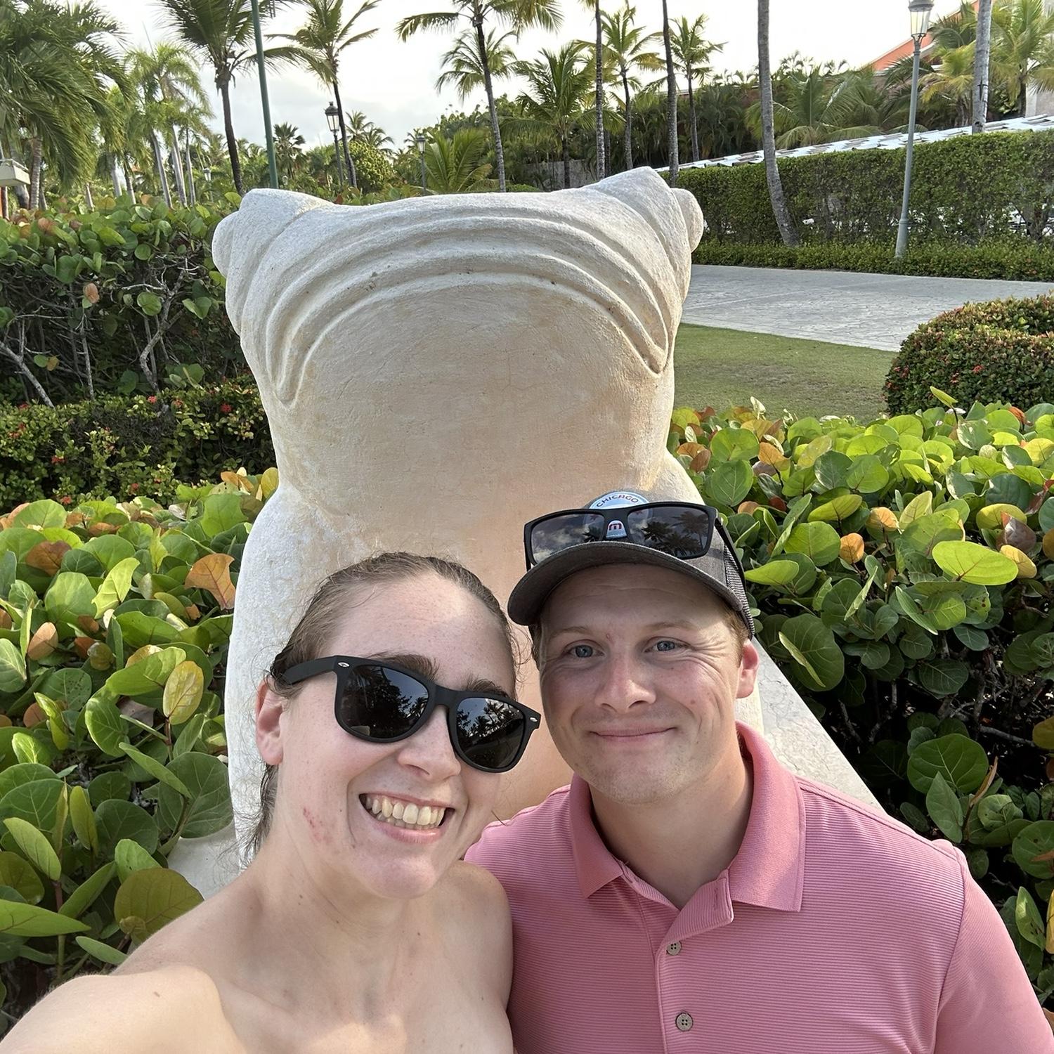 Another photo in Punta Cana...this time with a giant FROG. Kristen and Sean like finding silly statues in the towns they visit.
