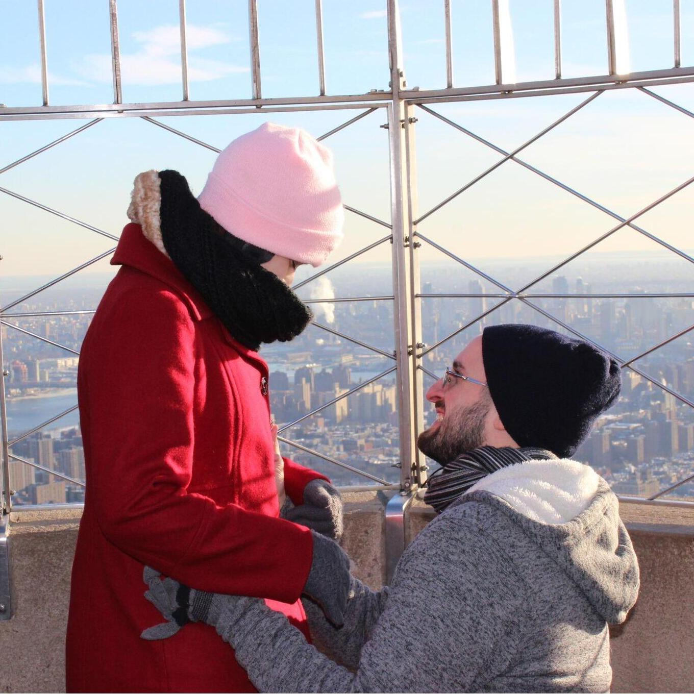 This is the proposal from the Empire State building (photo taken by his brother, Matt).