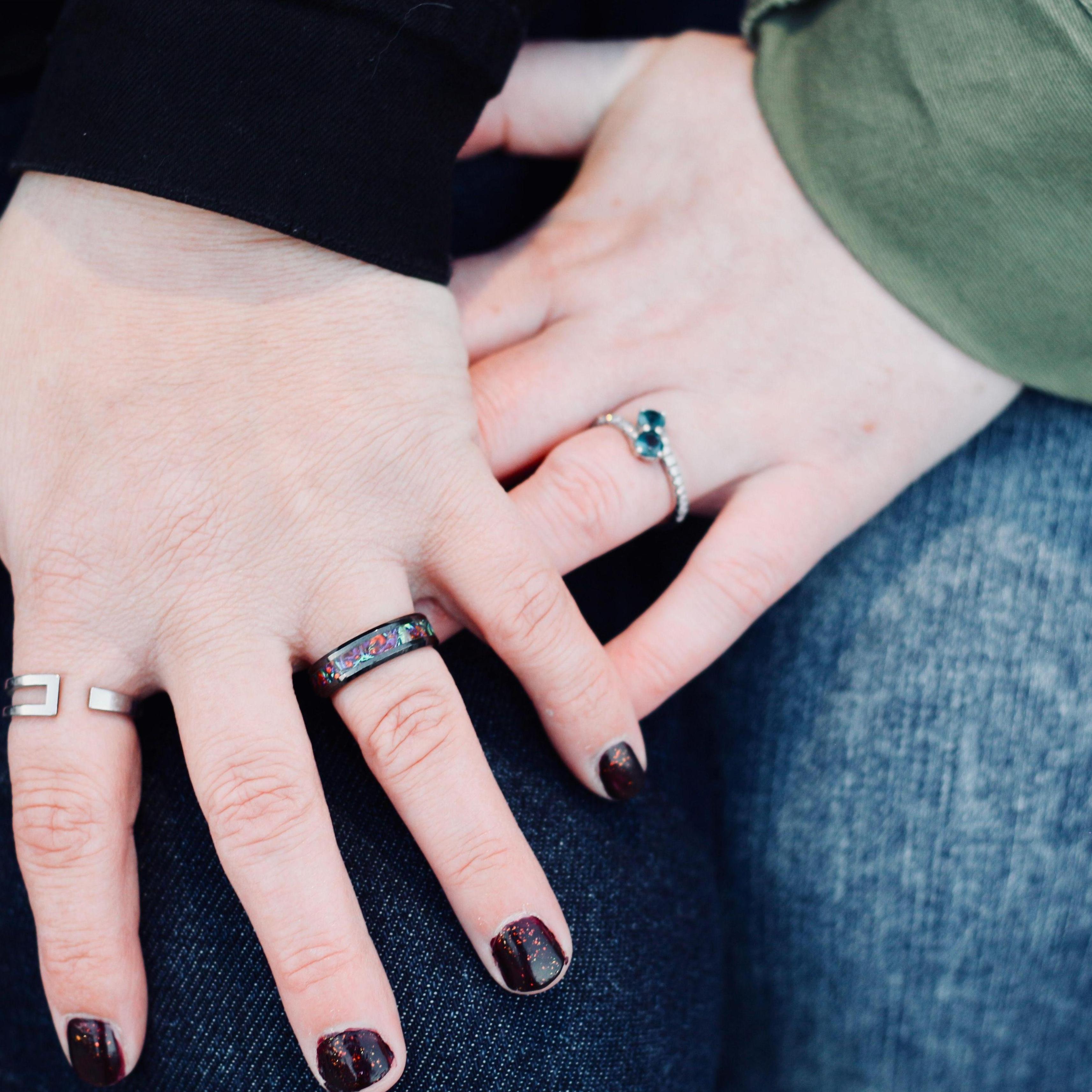 We love our engagement rings so much! (Photo: Emily Martinez)