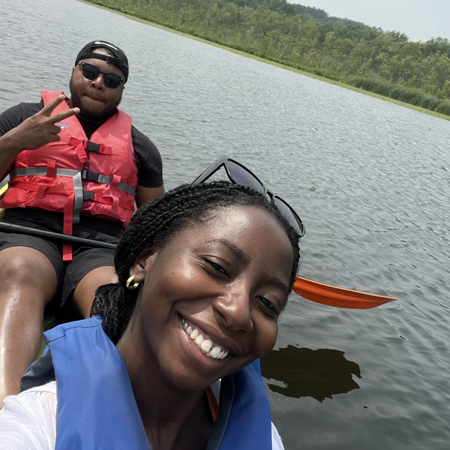 In Saratoga on a kayak. Chelese is scared but trying not to show it!