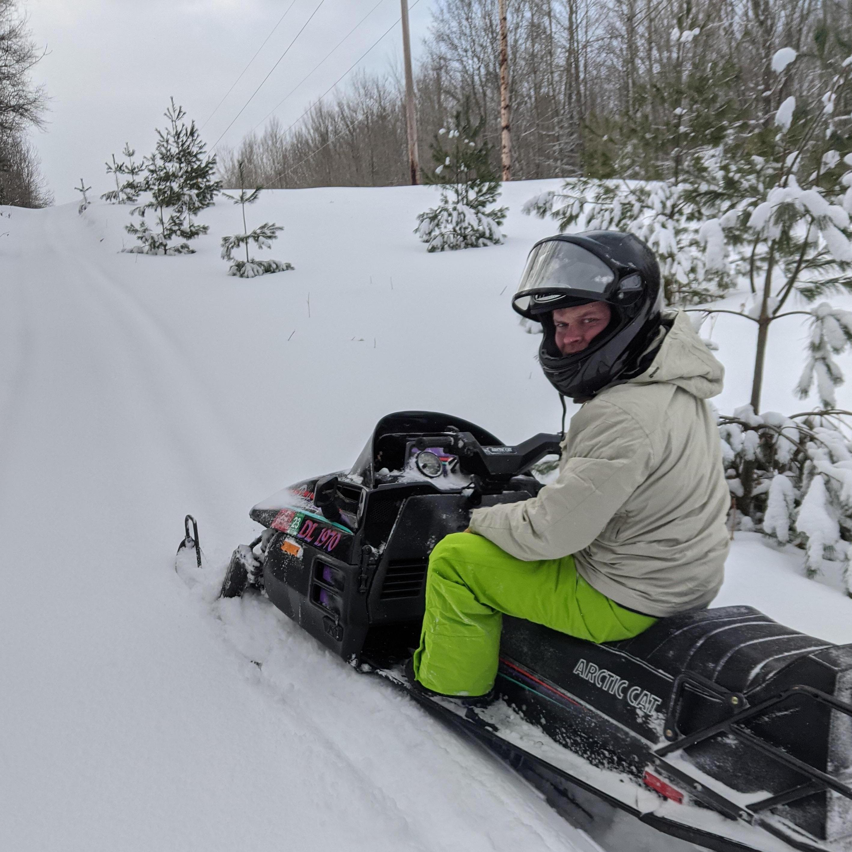 Snowmobiling at one of our favorite places in the world Fife Lake, MI!