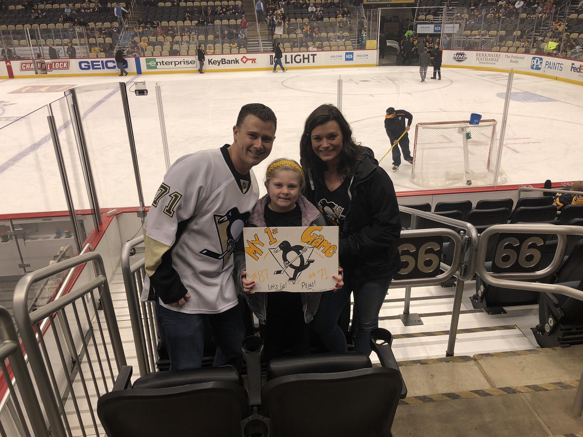 Jillian’s 1st 🐧 game 🏒💛🖤