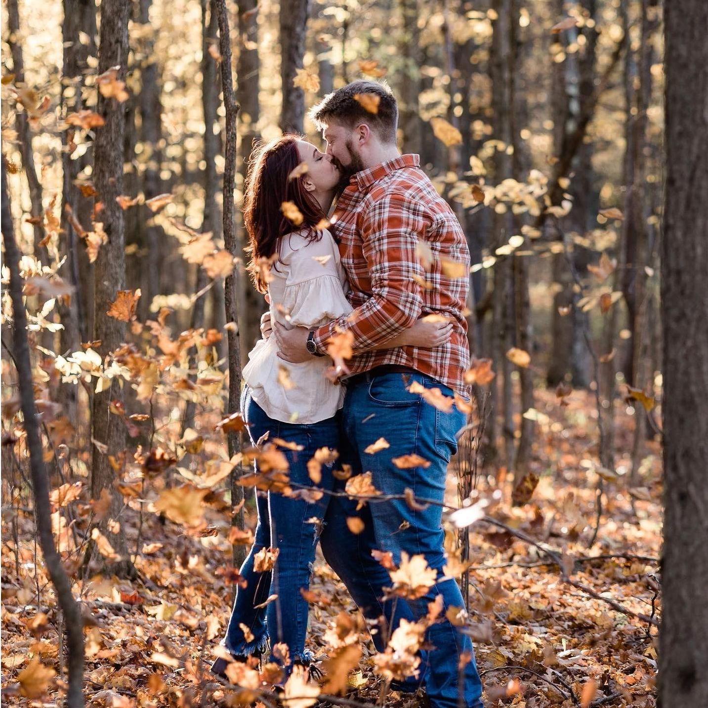 Playing in the leaves during our engagement shoot.