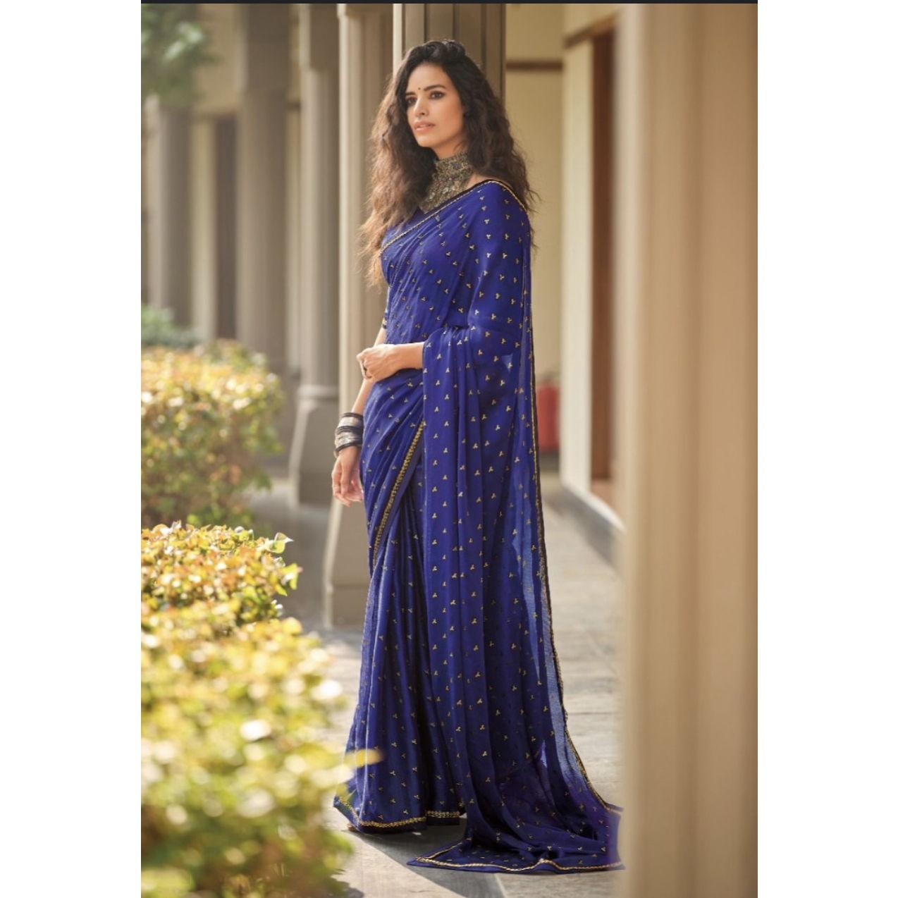 Saree-very long piece of fabric pleated & tied at the waist, one end draped over the shoulder. Can be complex, requires practice draping/pleating the fabric. Nowadays pre-stitched ones are available.