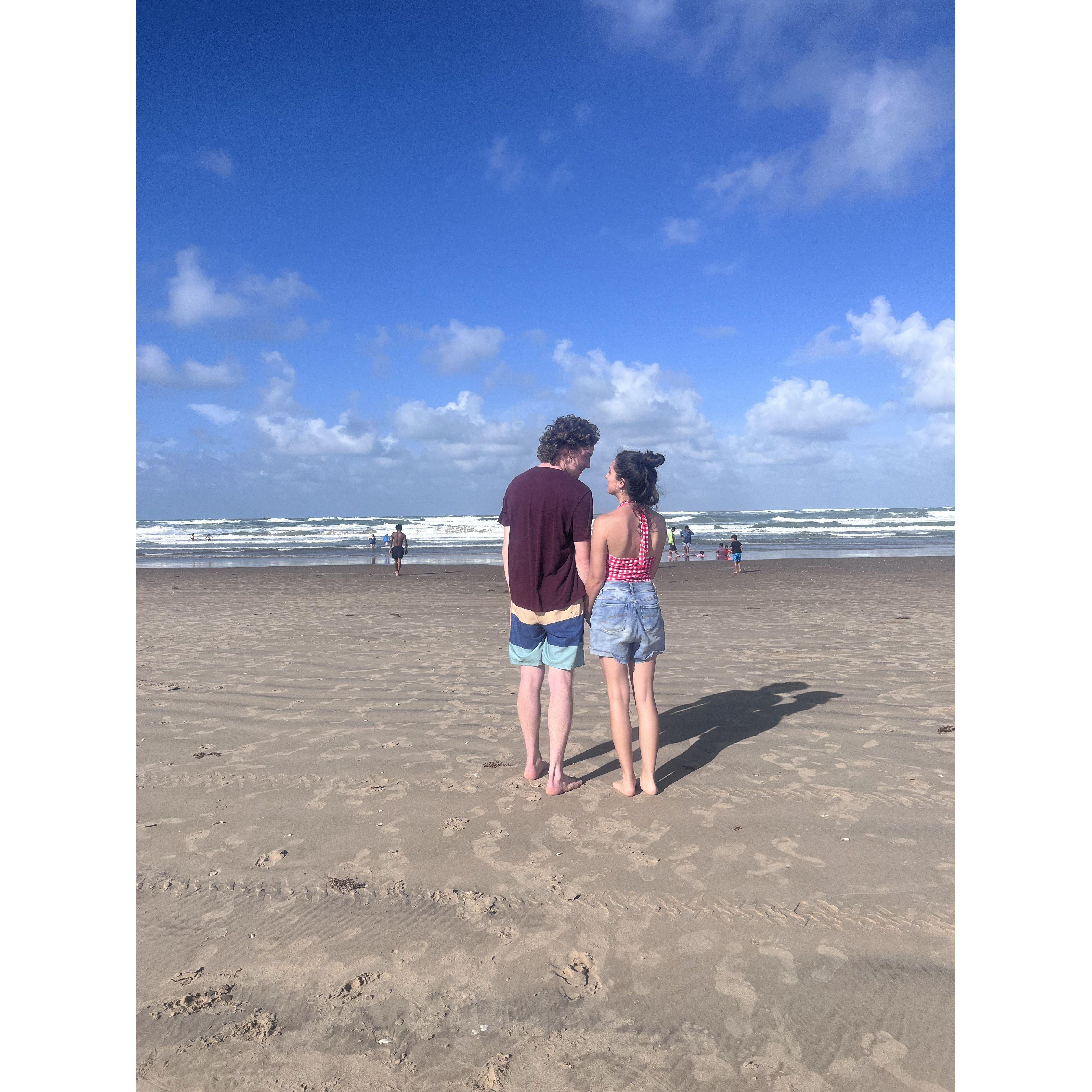 Us almost a year before the proposal, on the very same beach Daniel proposed at (South Padre Island).