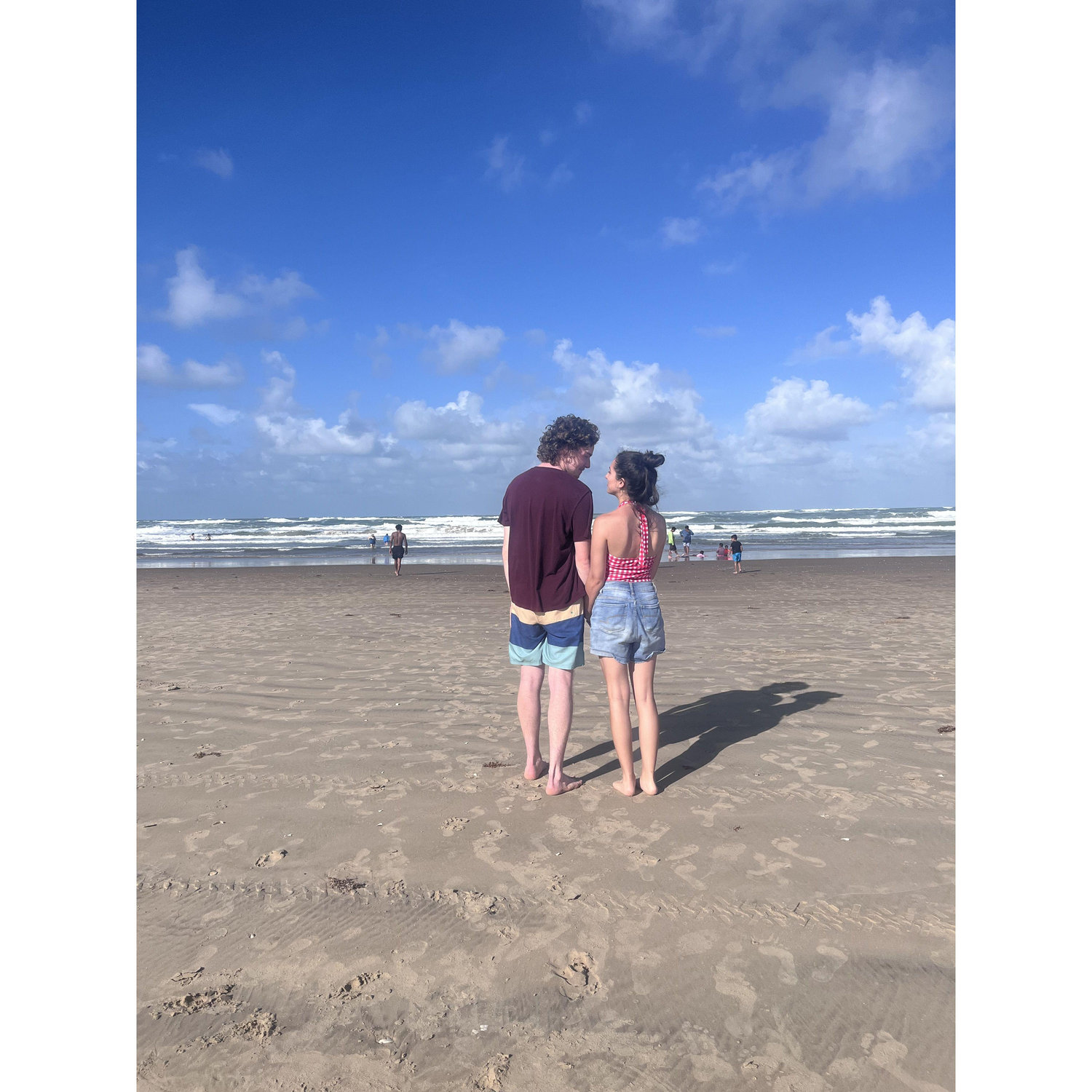 Us almost a year before the proposal, on the very same beach Daniel proposed at (South Padre Island).