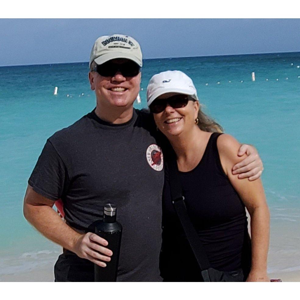 Alan and Sandra on the beach in Cayman Islands.