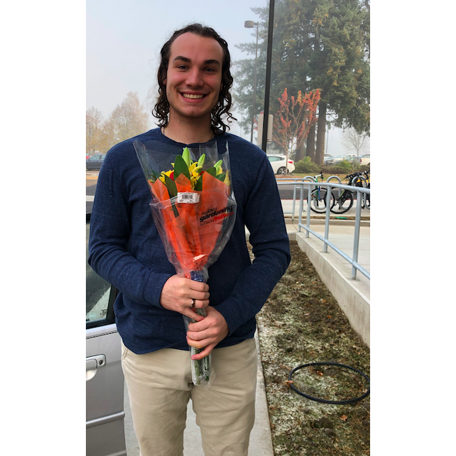 One year anniversary. Jonah planned a beach picnic for us that we enjoyed in the car while watching the rain.